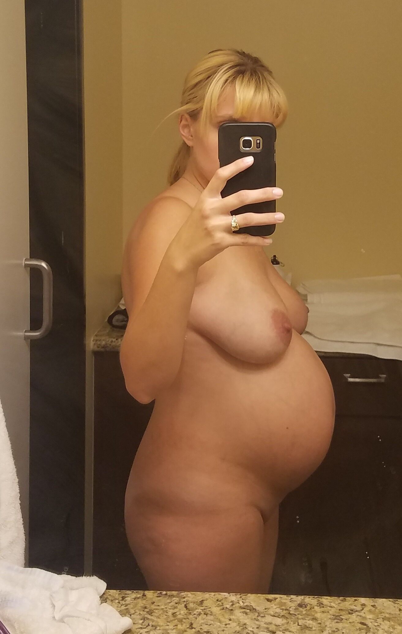 Pregnant amateur wife shows off shaved pussy and big breasts 2