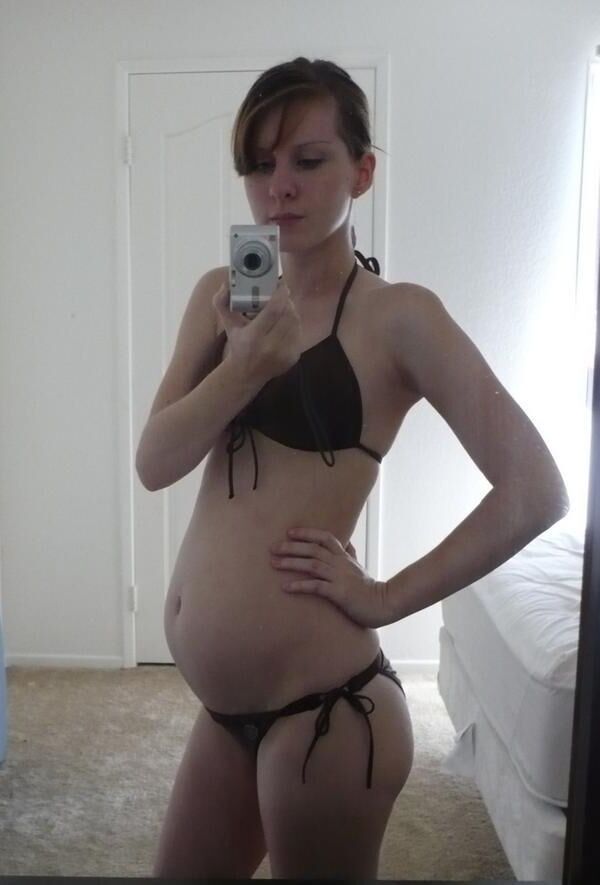 [Pregnant] young redhead