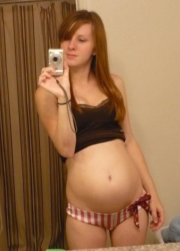 [Pregnant] young redhead