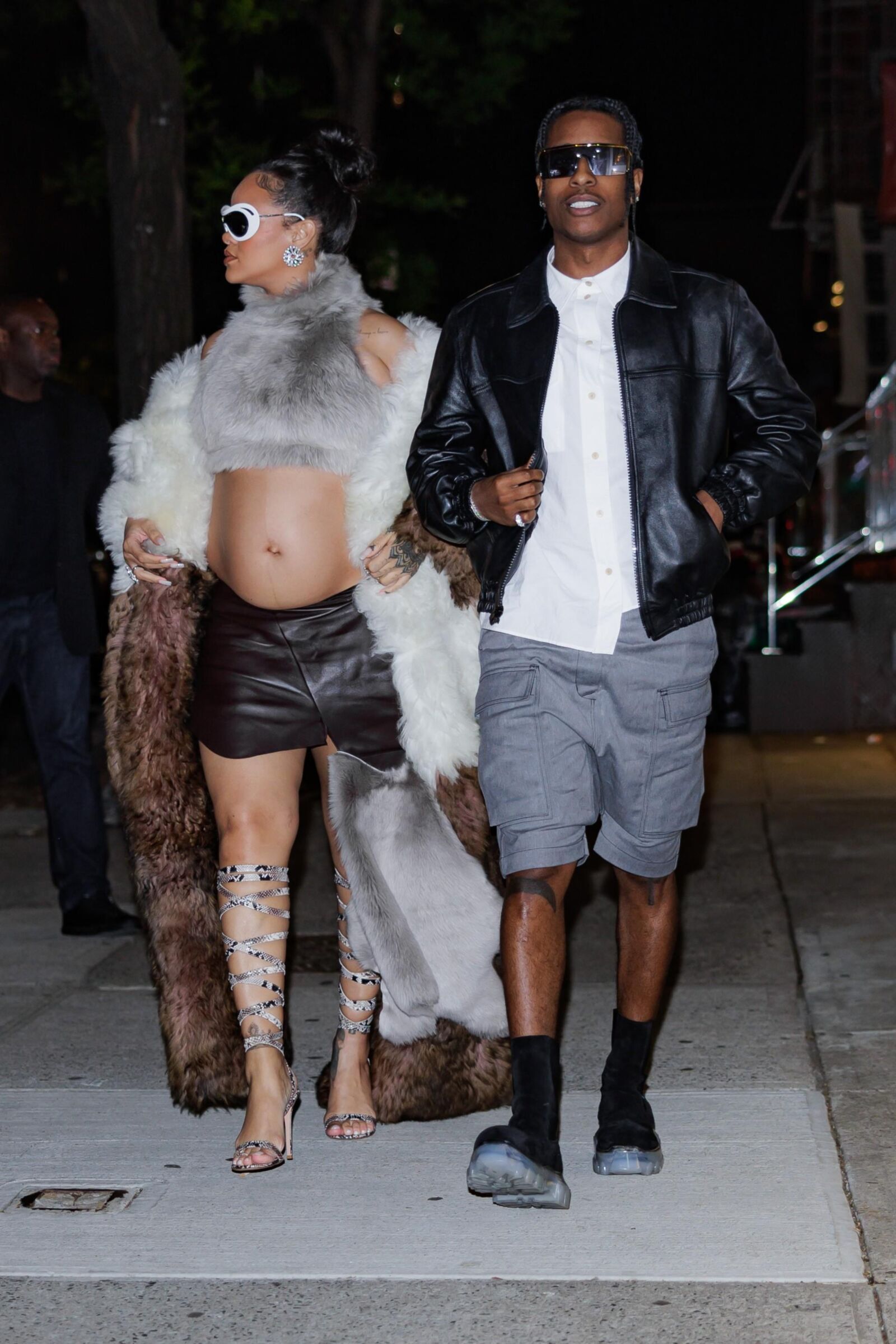 Rihanna - Shows off her bump in a fur coat 