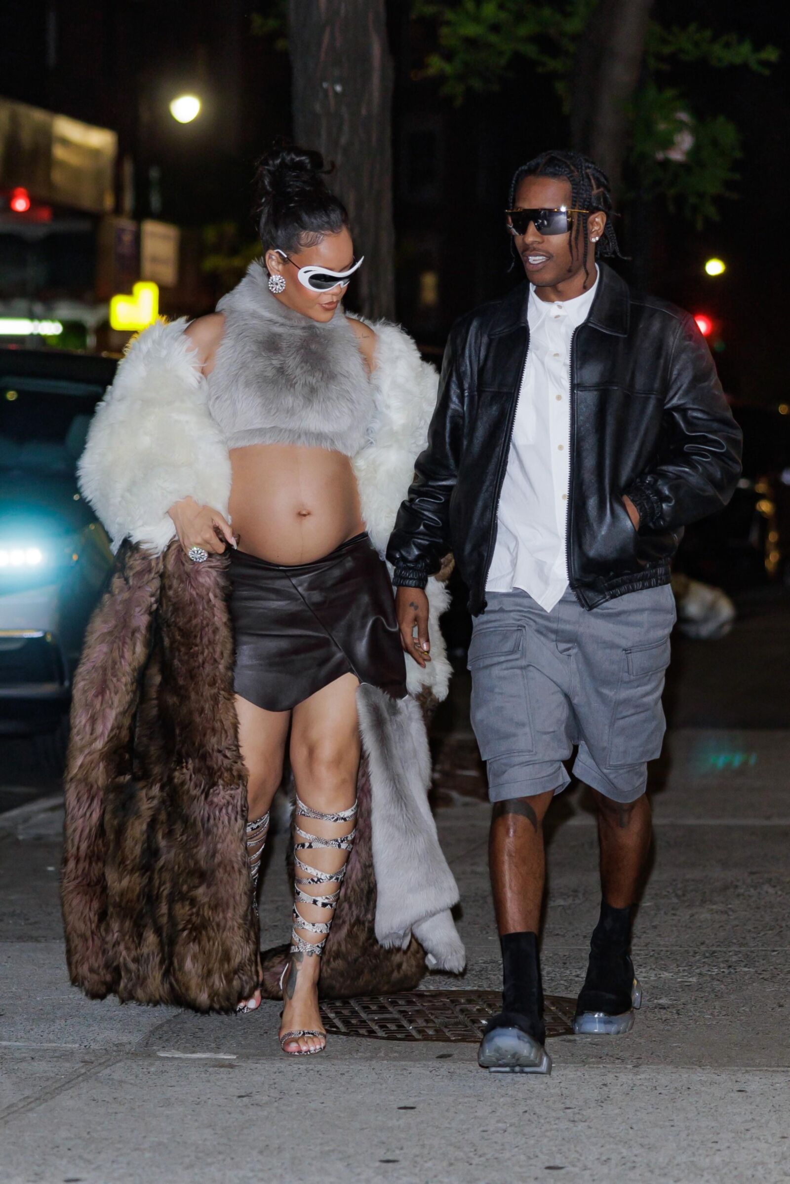 Rihanna - Shows off her bump in a fur coat 