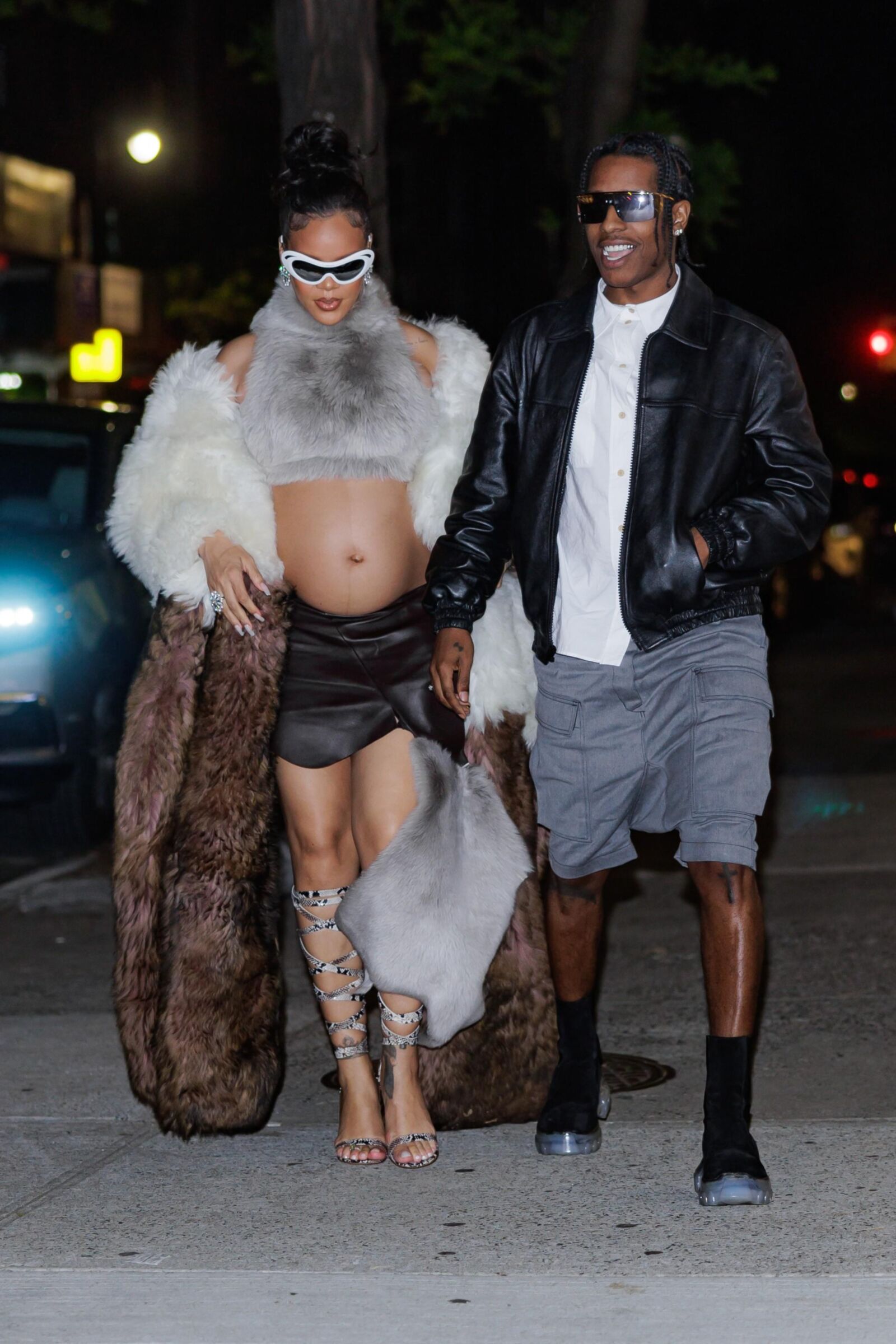 Rihanna - Shows off her bump in a fur coat 