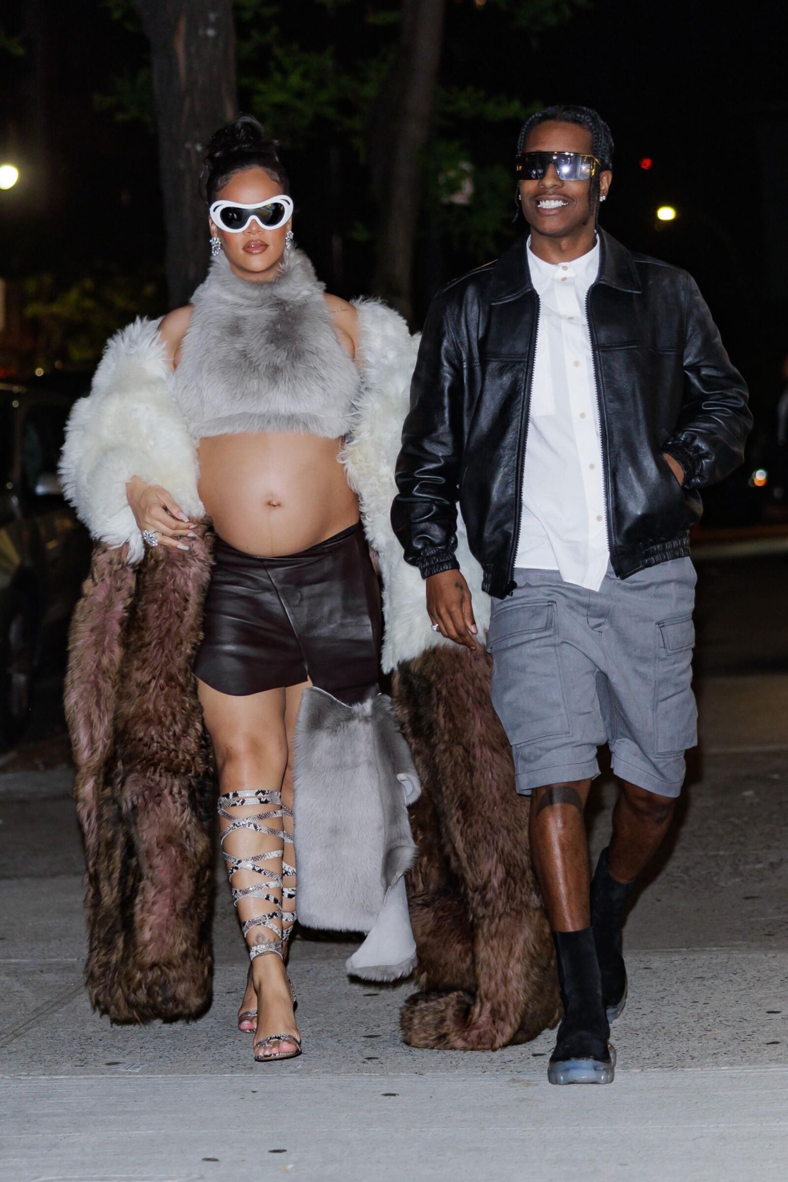 Rihanna - Shows off her bump in a fur coat 