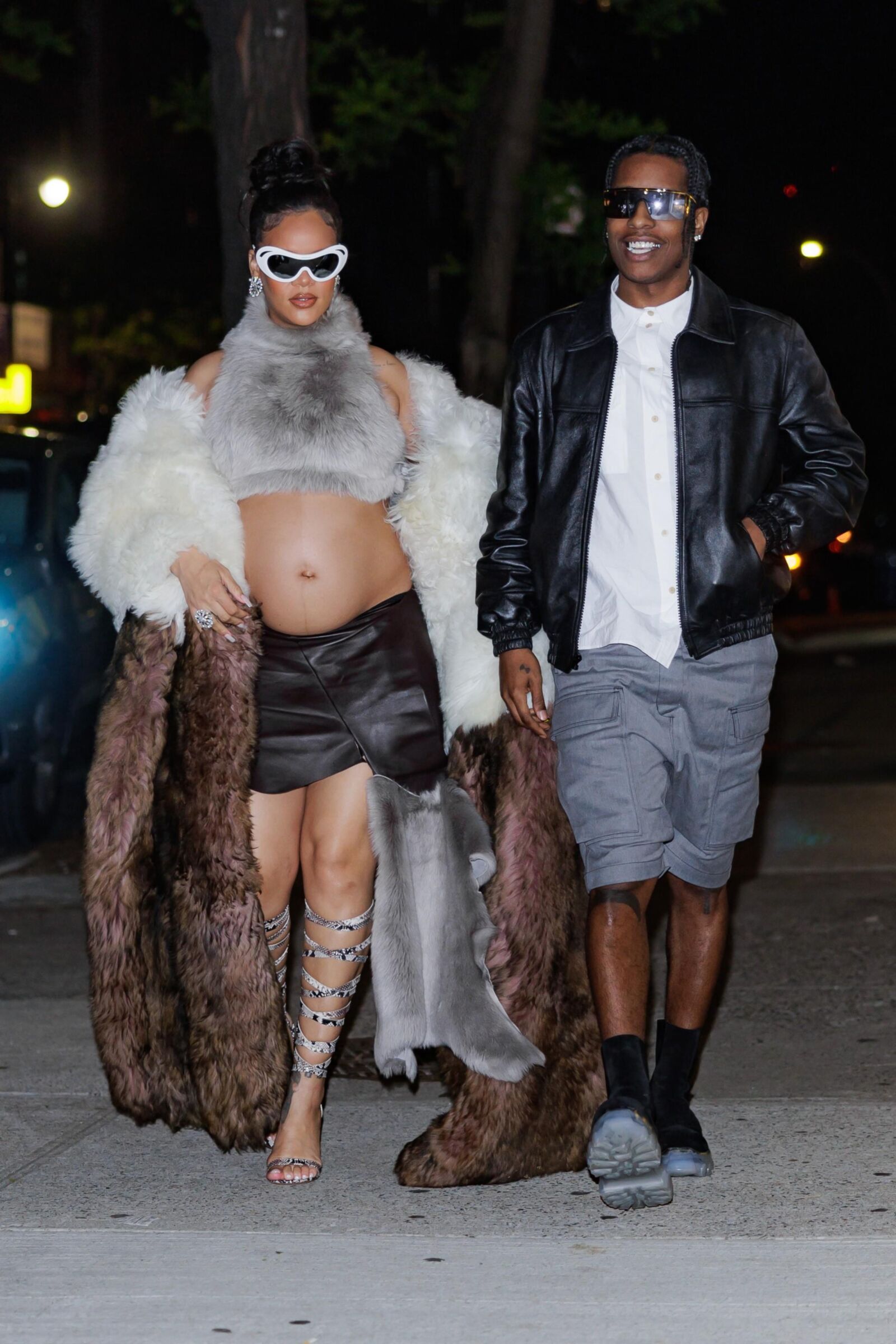 Rihanna - Shows off her bump in a fur coat 