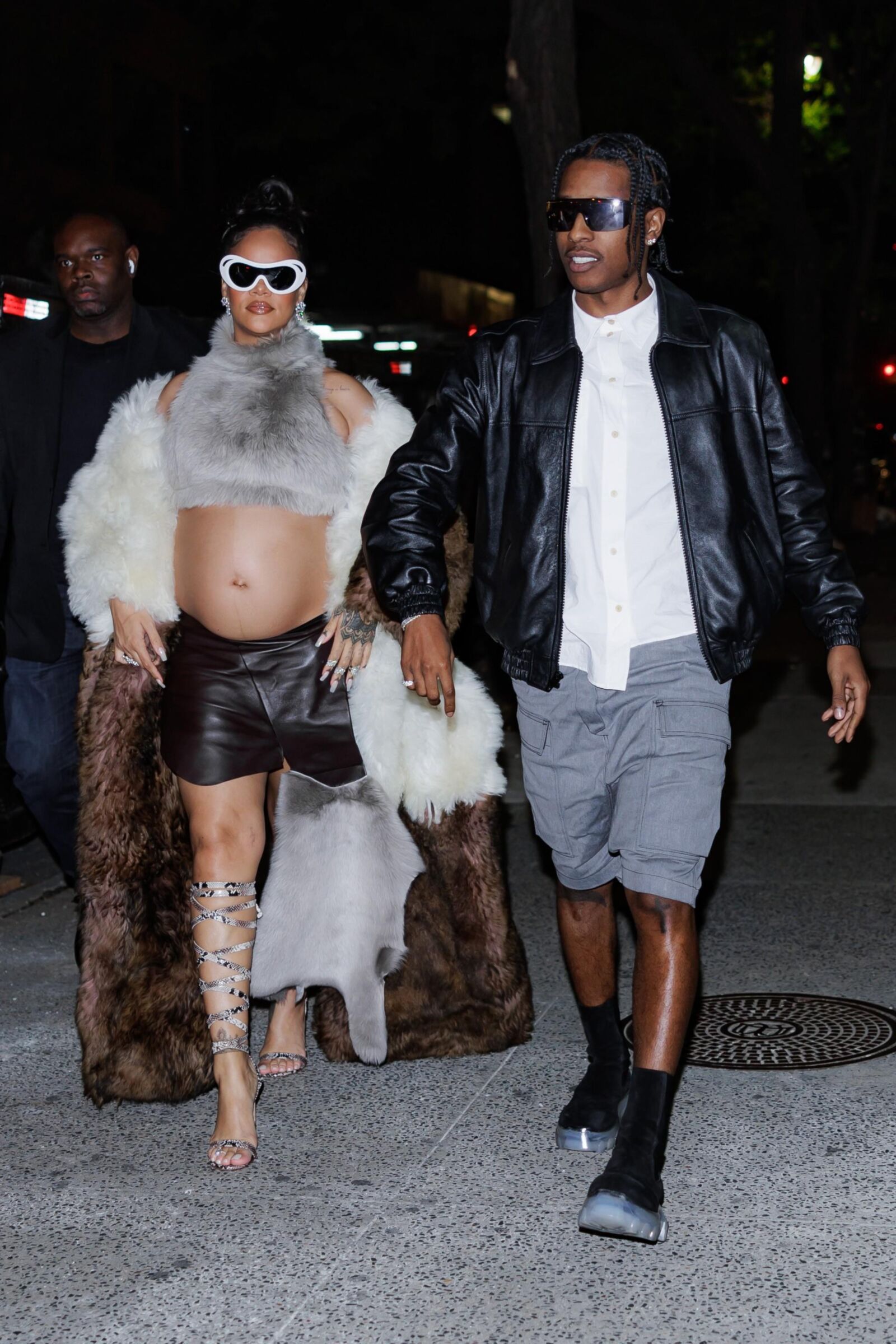 Rihanna - Shows off her bump in a fur coat 