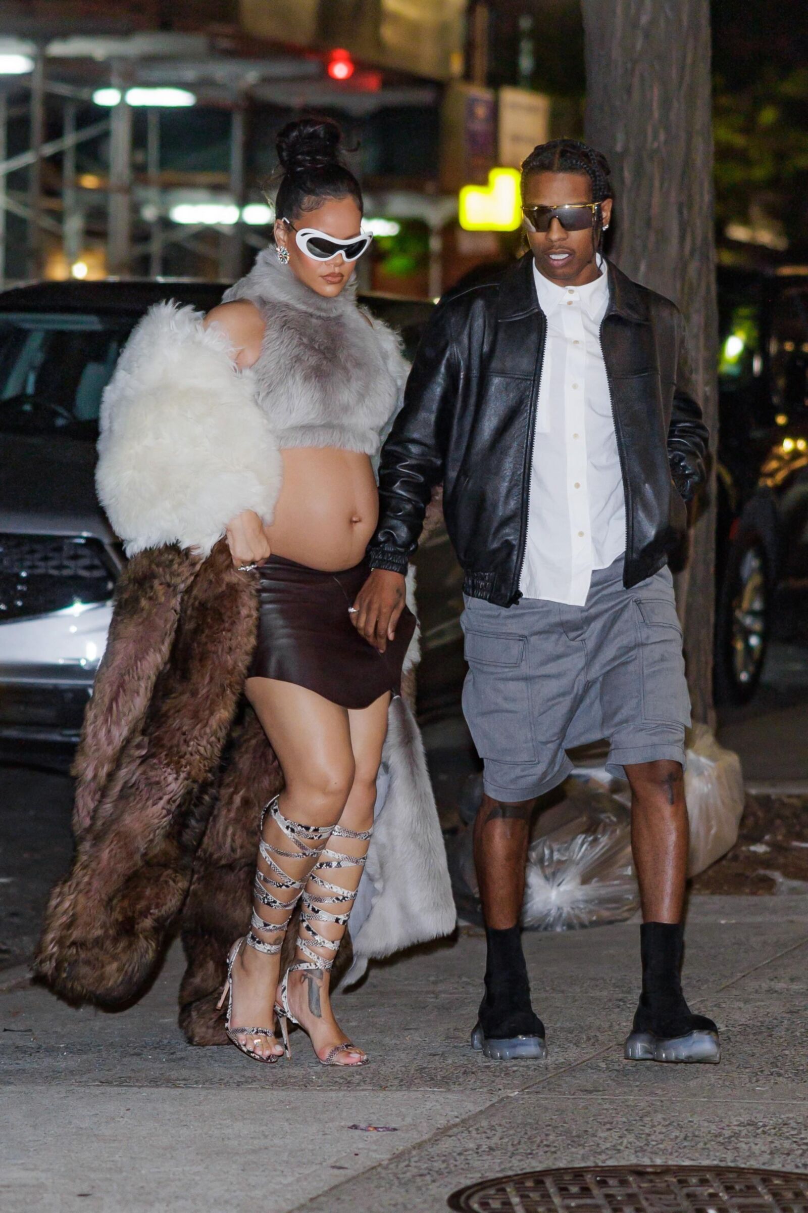 Rihanna - Shows off her bump in a fur coat 