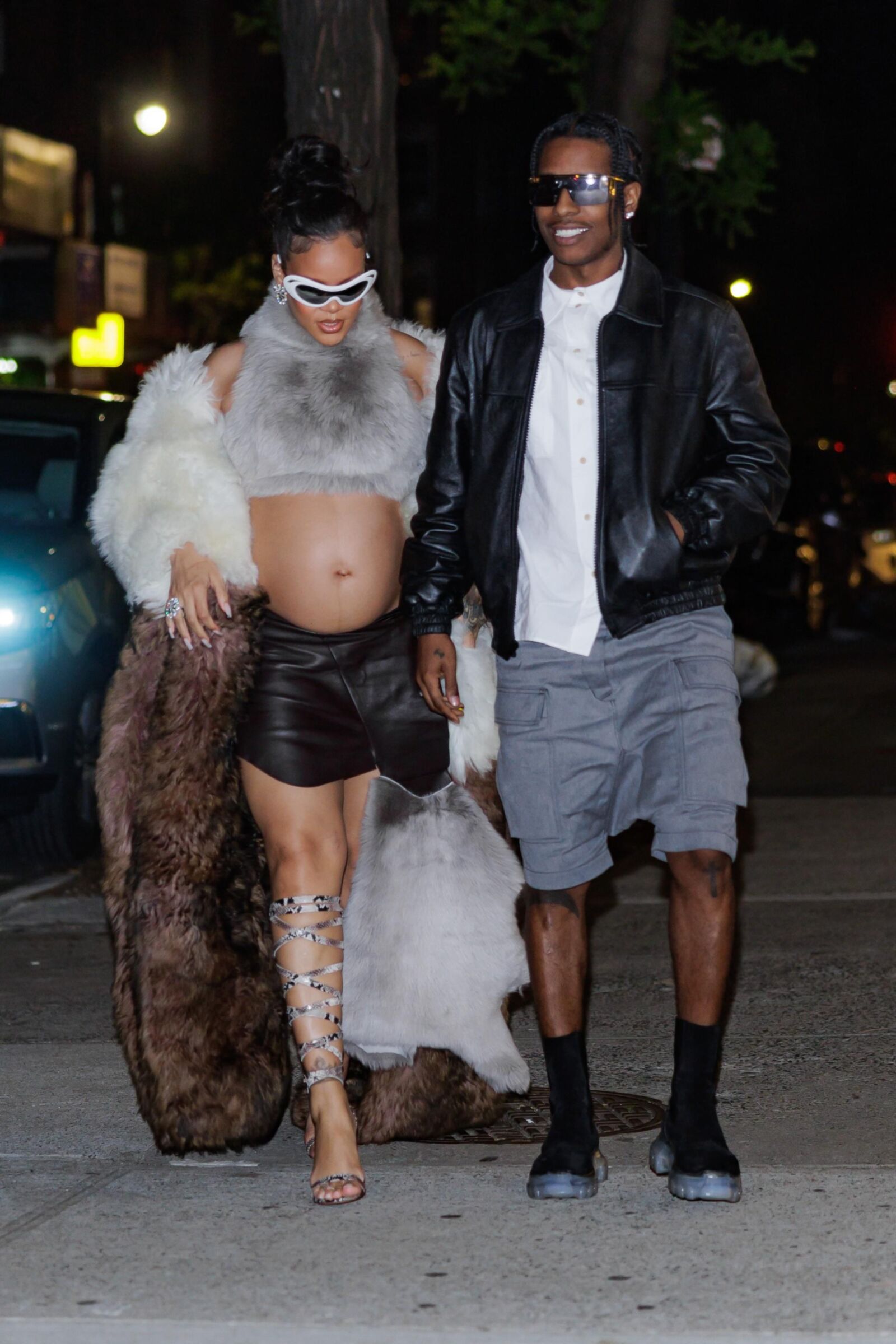 Rihanna - Shows off her bump in a fur coat 