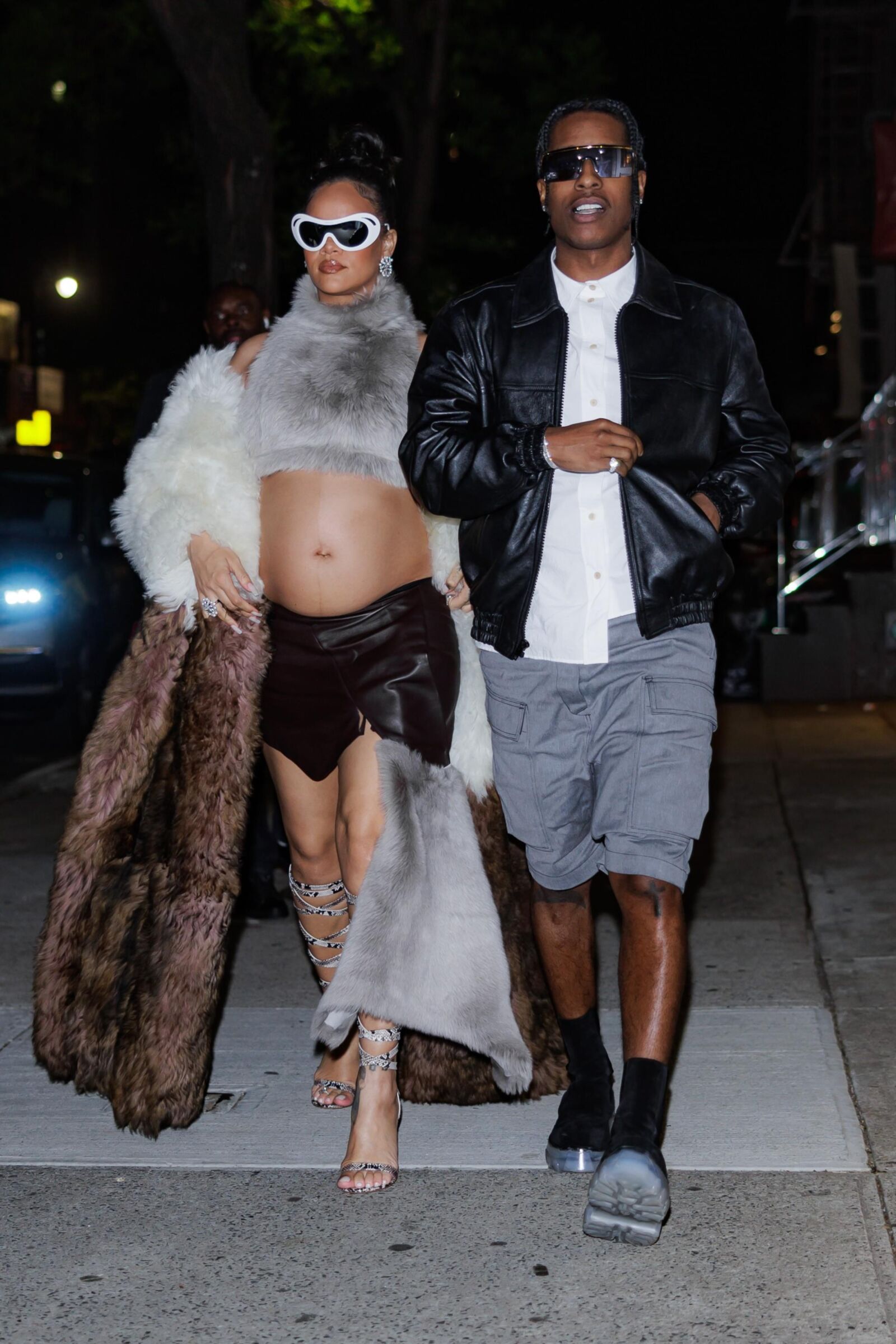 Rihanna - Shows off her bump in a fur coat 