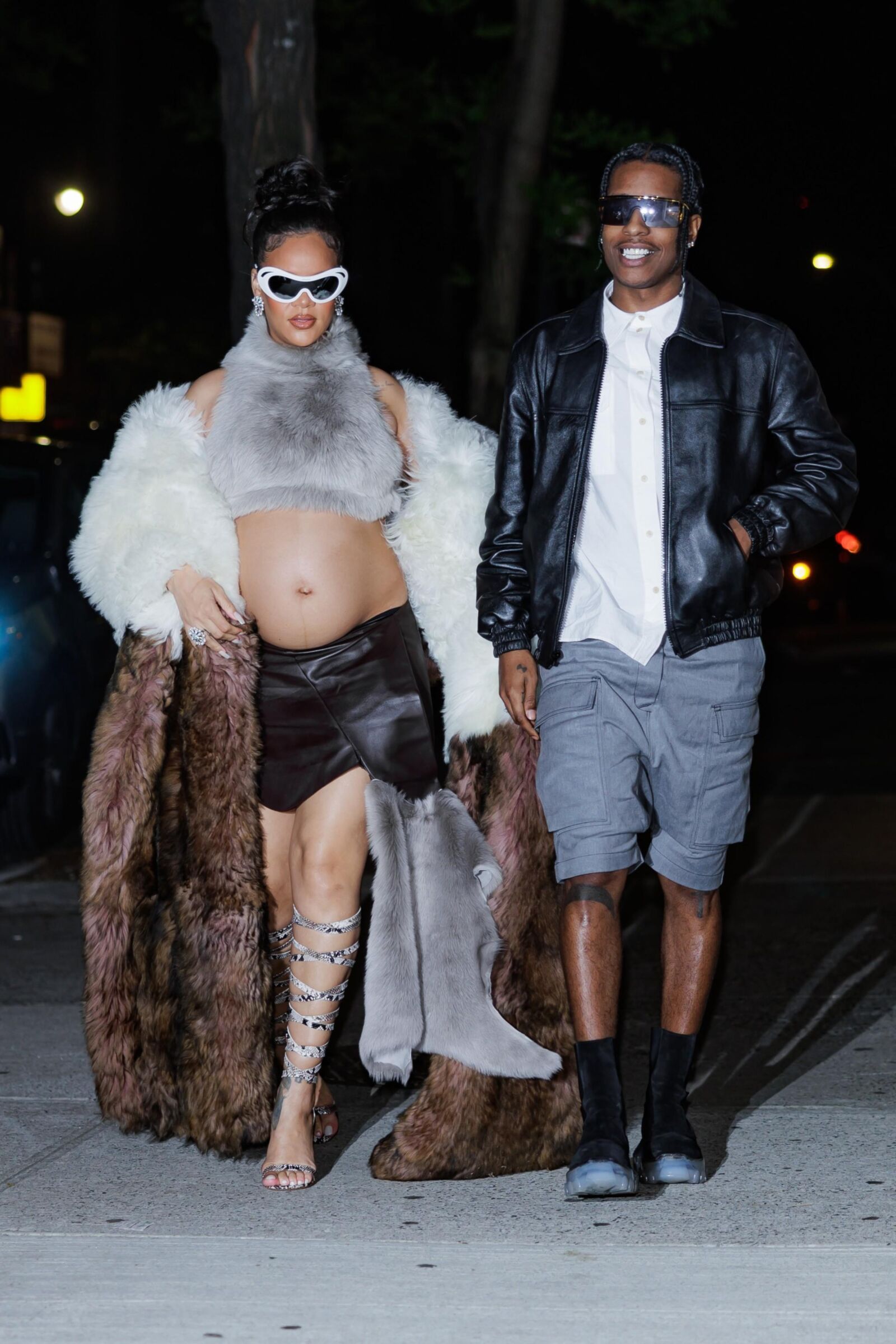 Rihanna - Shows off her bump in a fur coat 