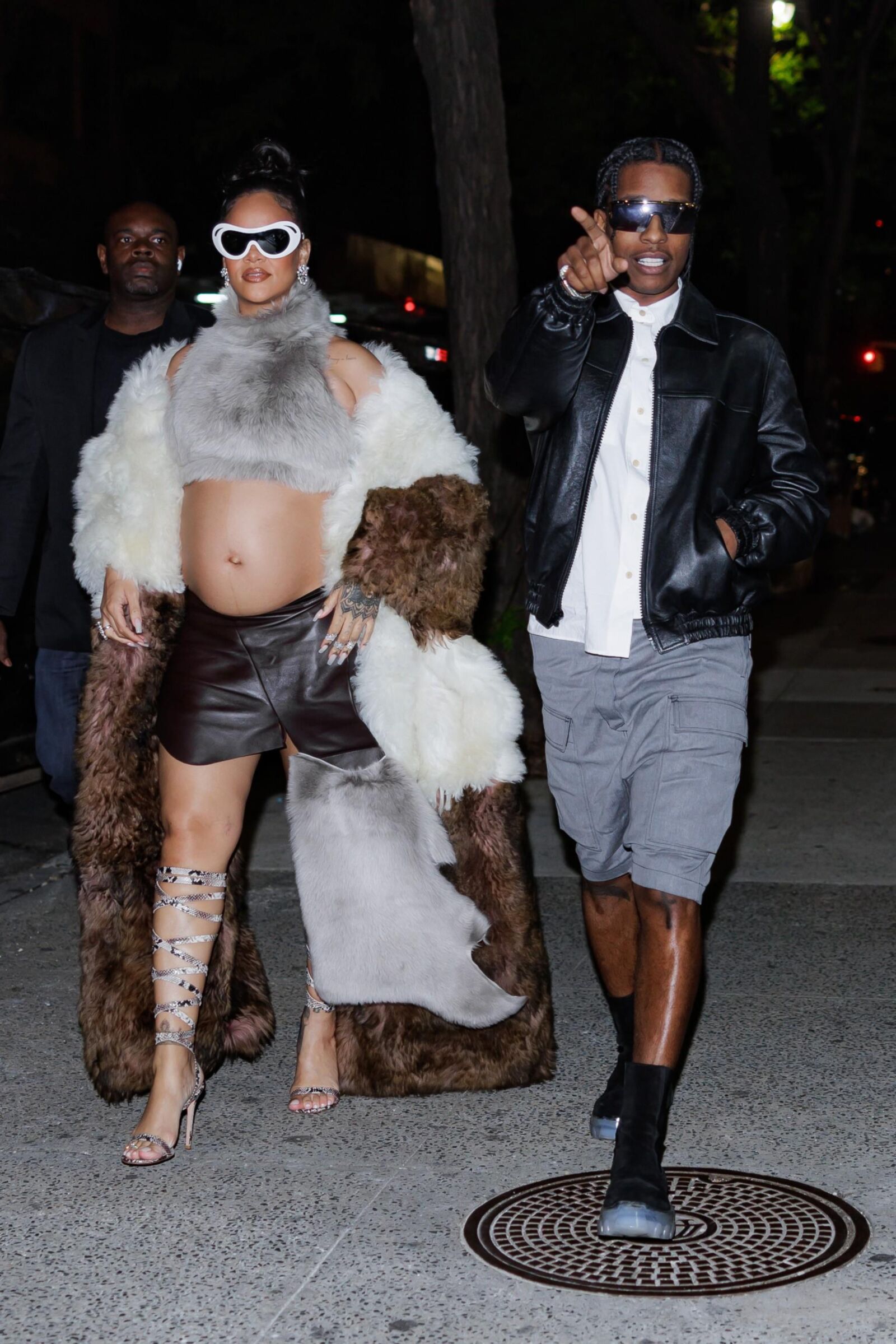 Rihanna - Shows off her bump in a fur coat 