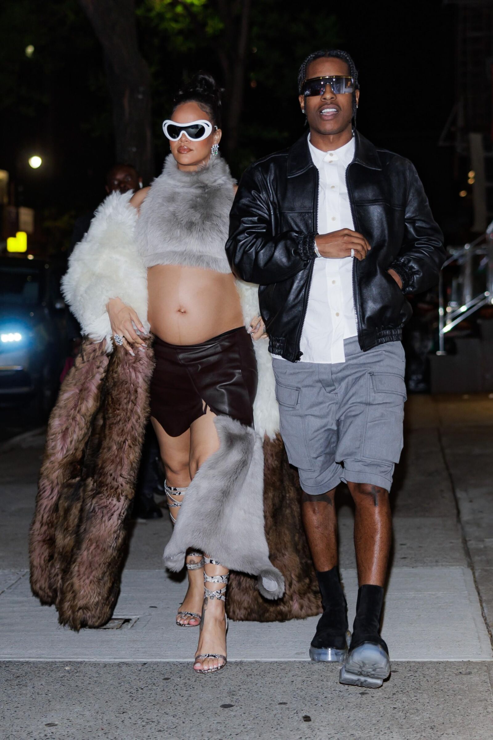 Rihanna - Shows off her bump in a fur coat 