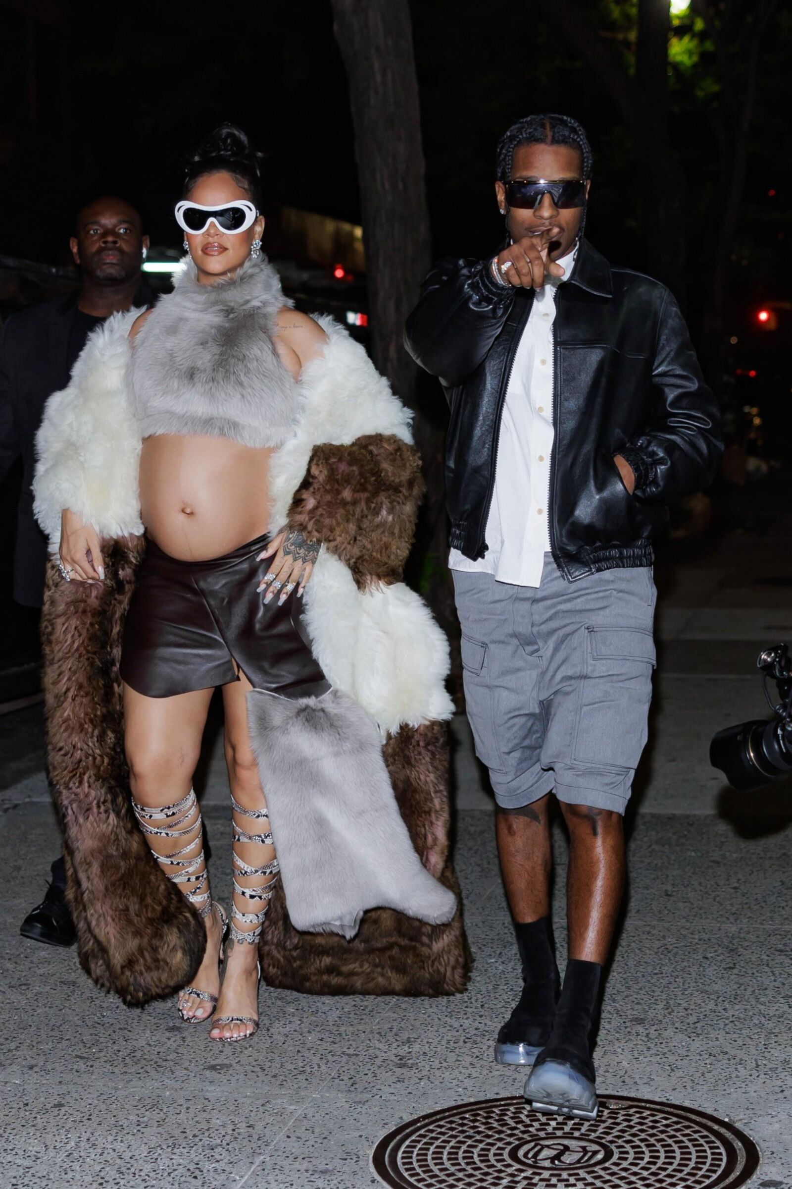 Rihanna - Shows off her bump in a fur coat 