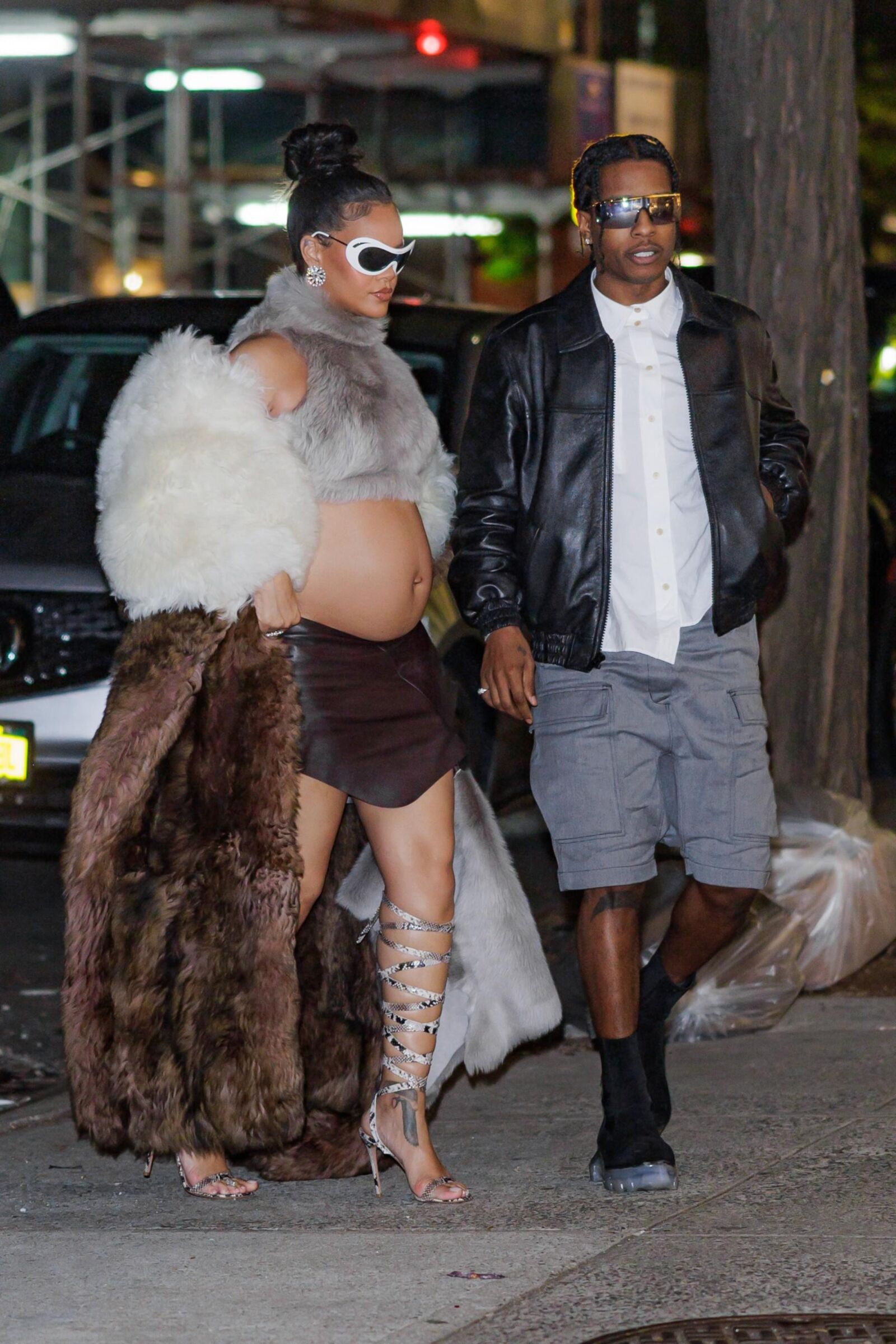 Rihanna - Shows off her bump in a fur coat 