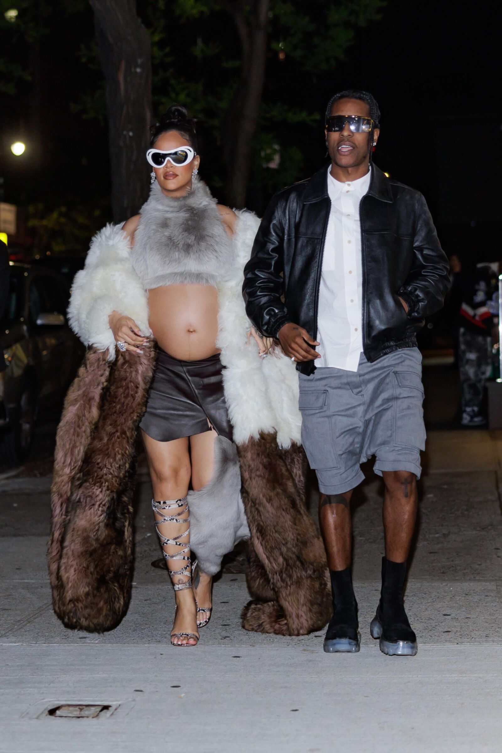 Rihanna - Shows off her bump in a fur coat 