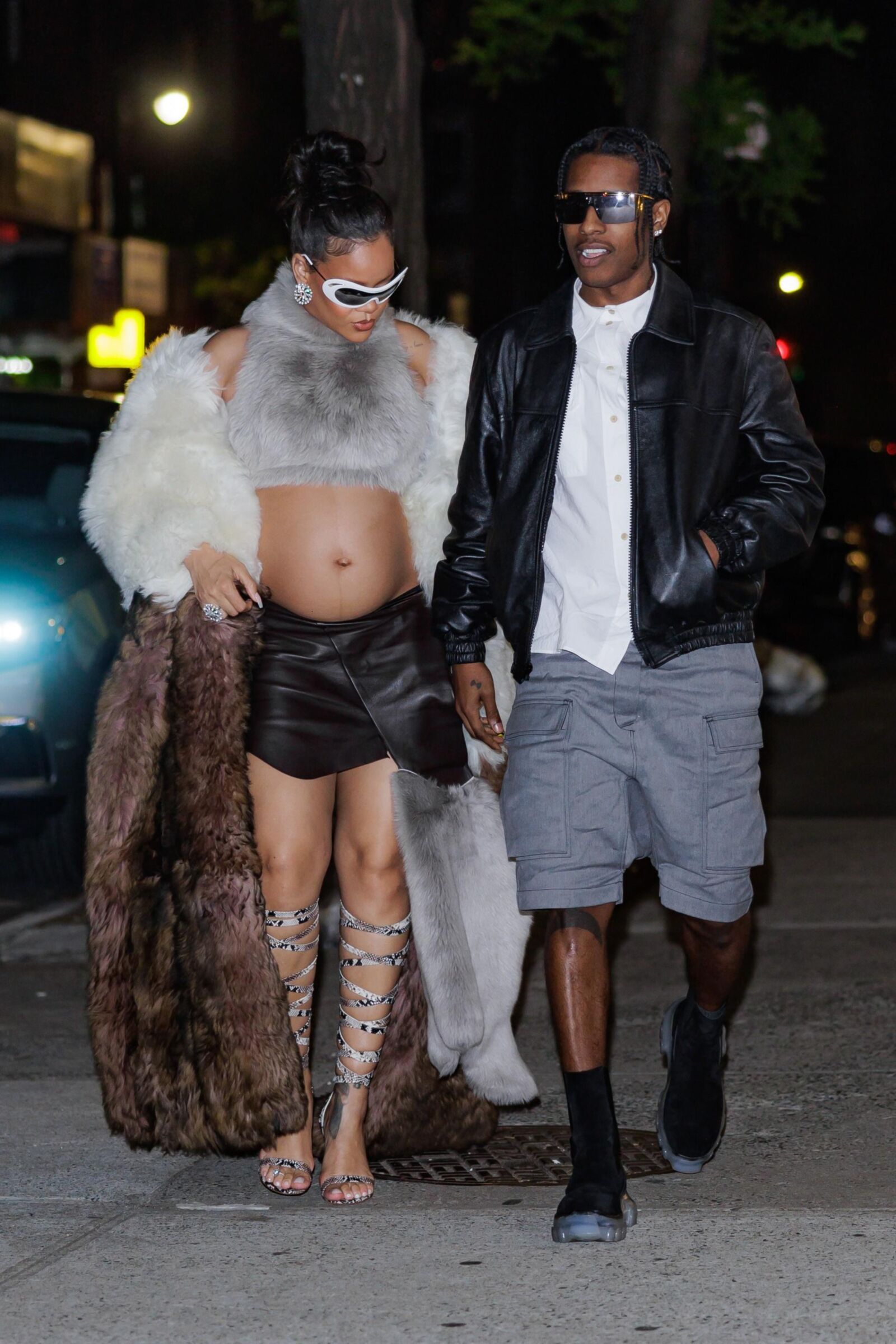 Rihanna - Shows off her bump in a fur coat 