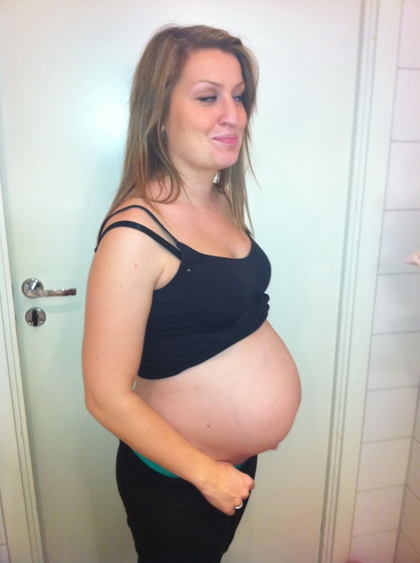 Blond MILF posing and playing - pregnant