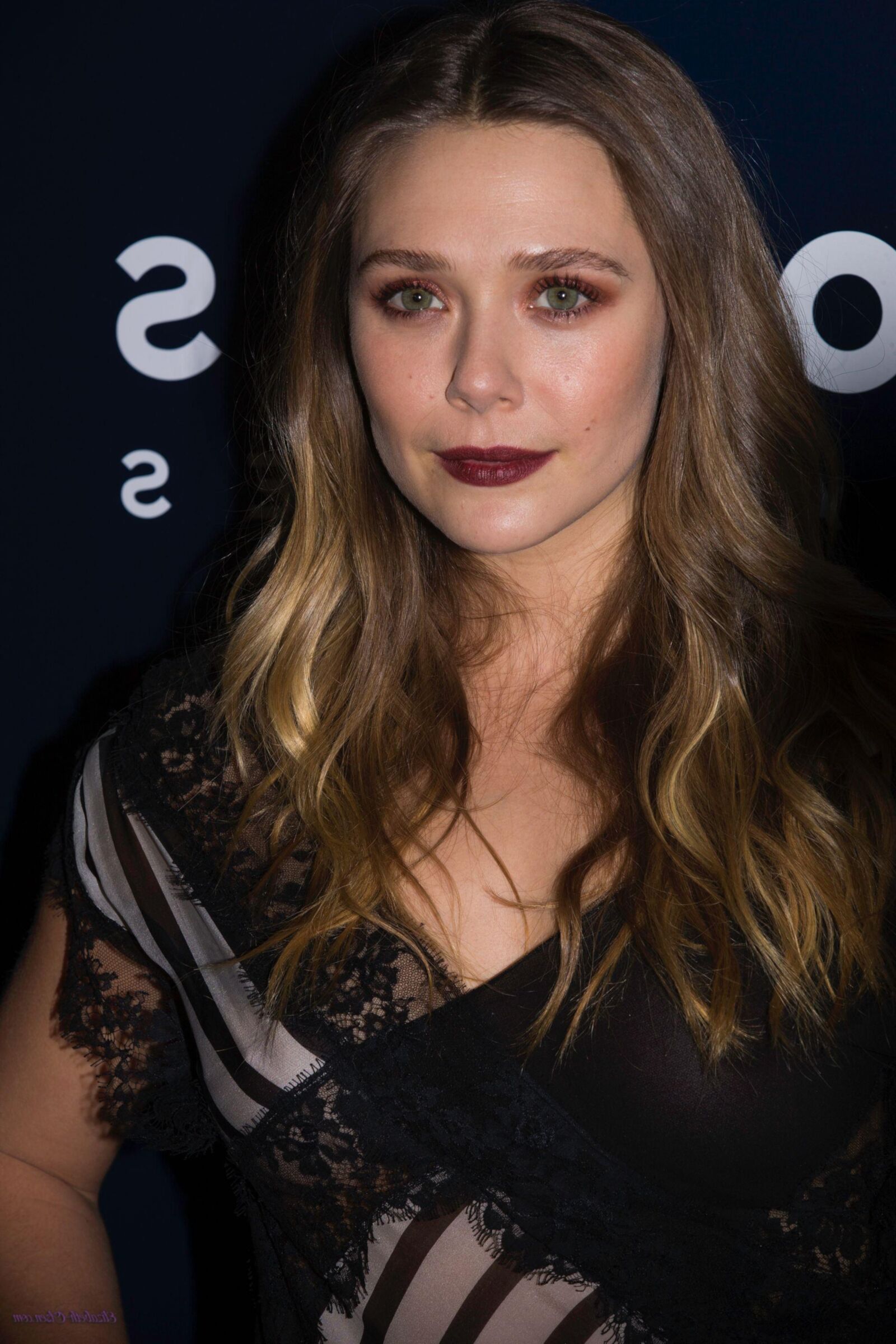 Elisabeth Olsen see thru dress shows her sweet curves