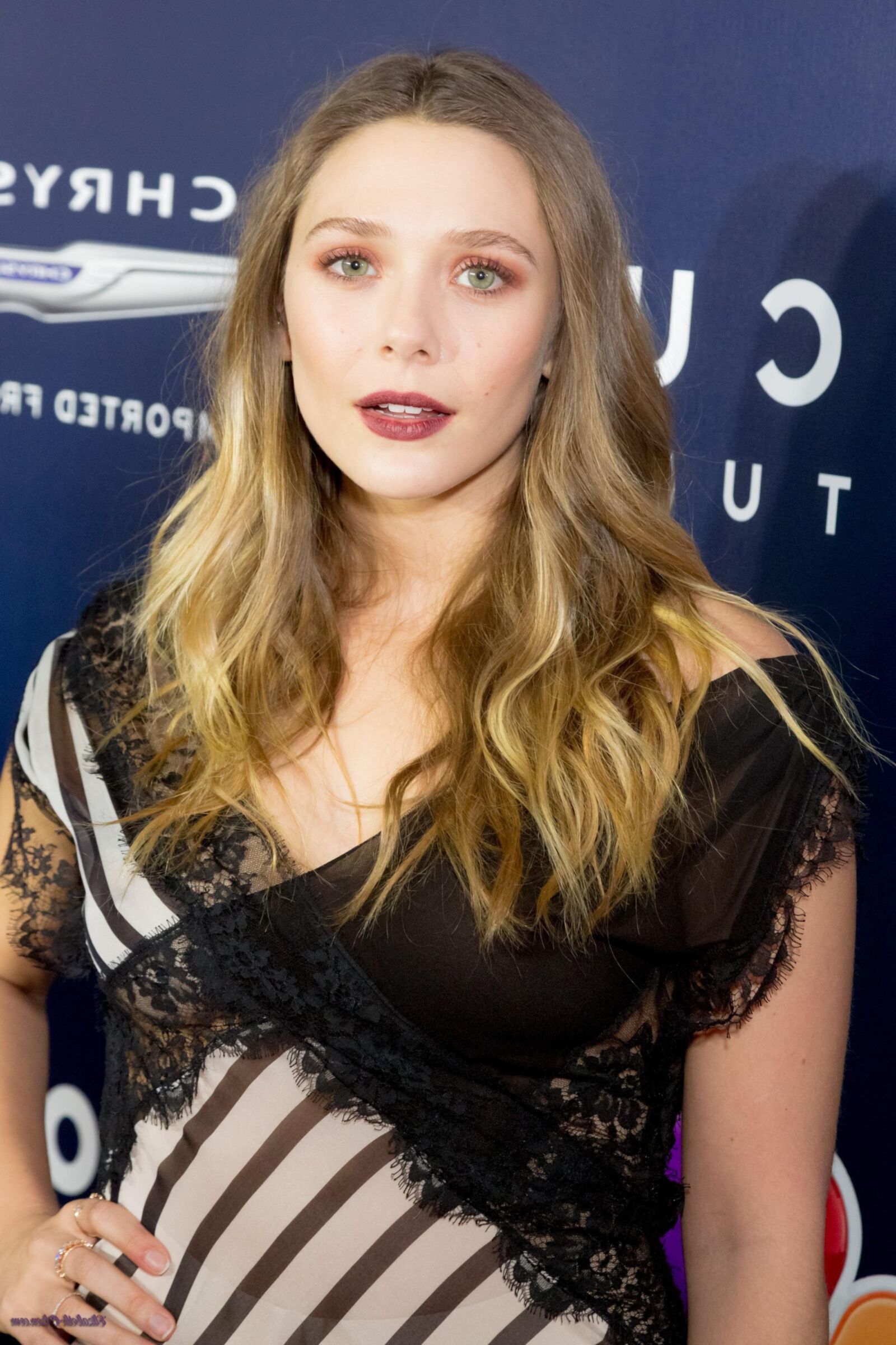 Elisabeth Olsen see thru dress shows her sweet curves