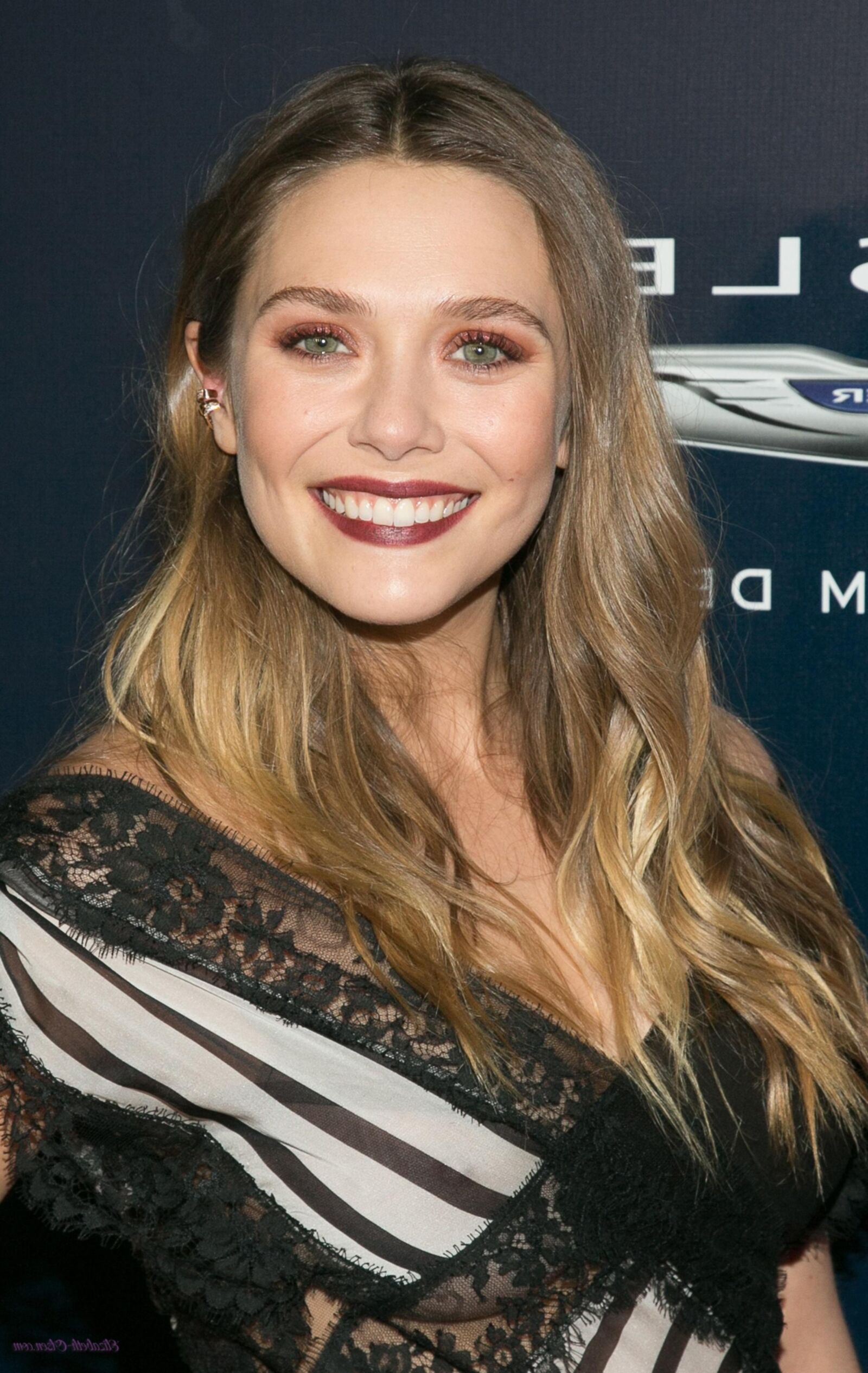 Elisabeth Olsen see thru dress shows her sweet curves