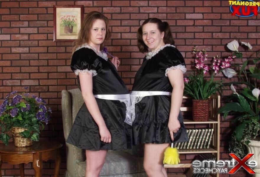 Karen and Nikki pose while pregnant