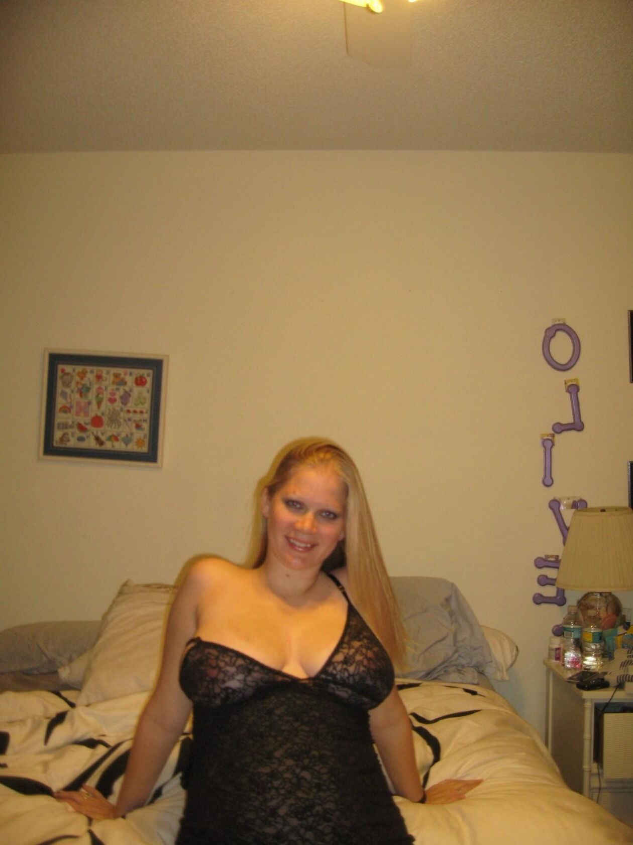 Blonde pregnant teen with big breasts