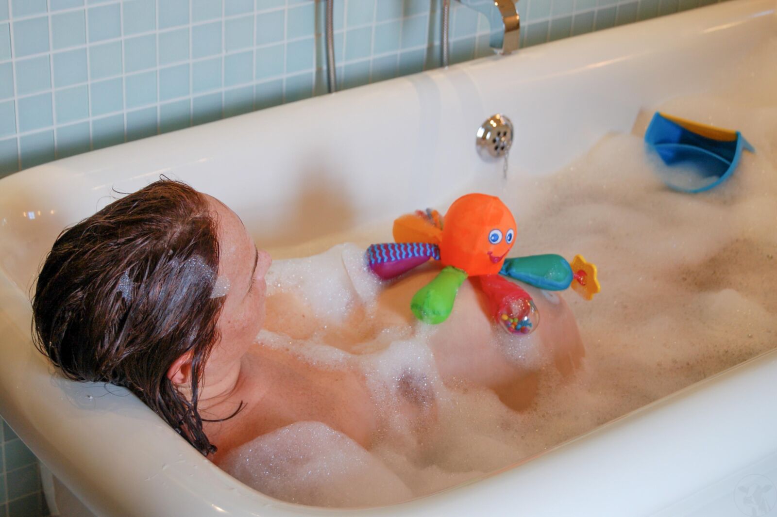 Mujeres en el baño Juguetes de baño