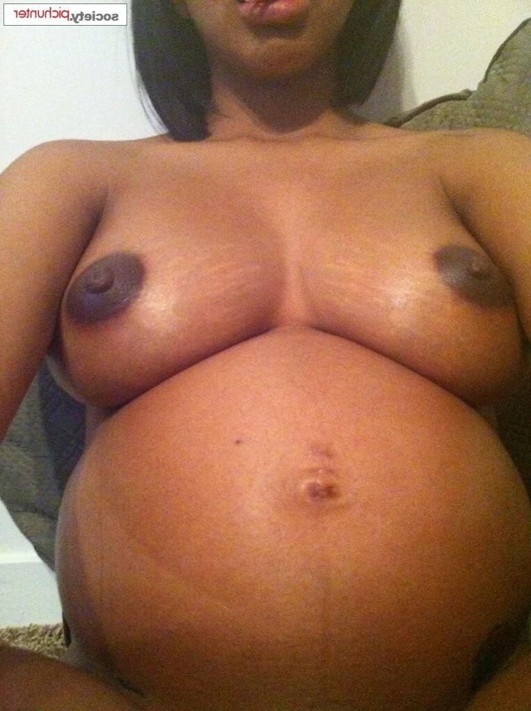 Pregnant black girl in the shower