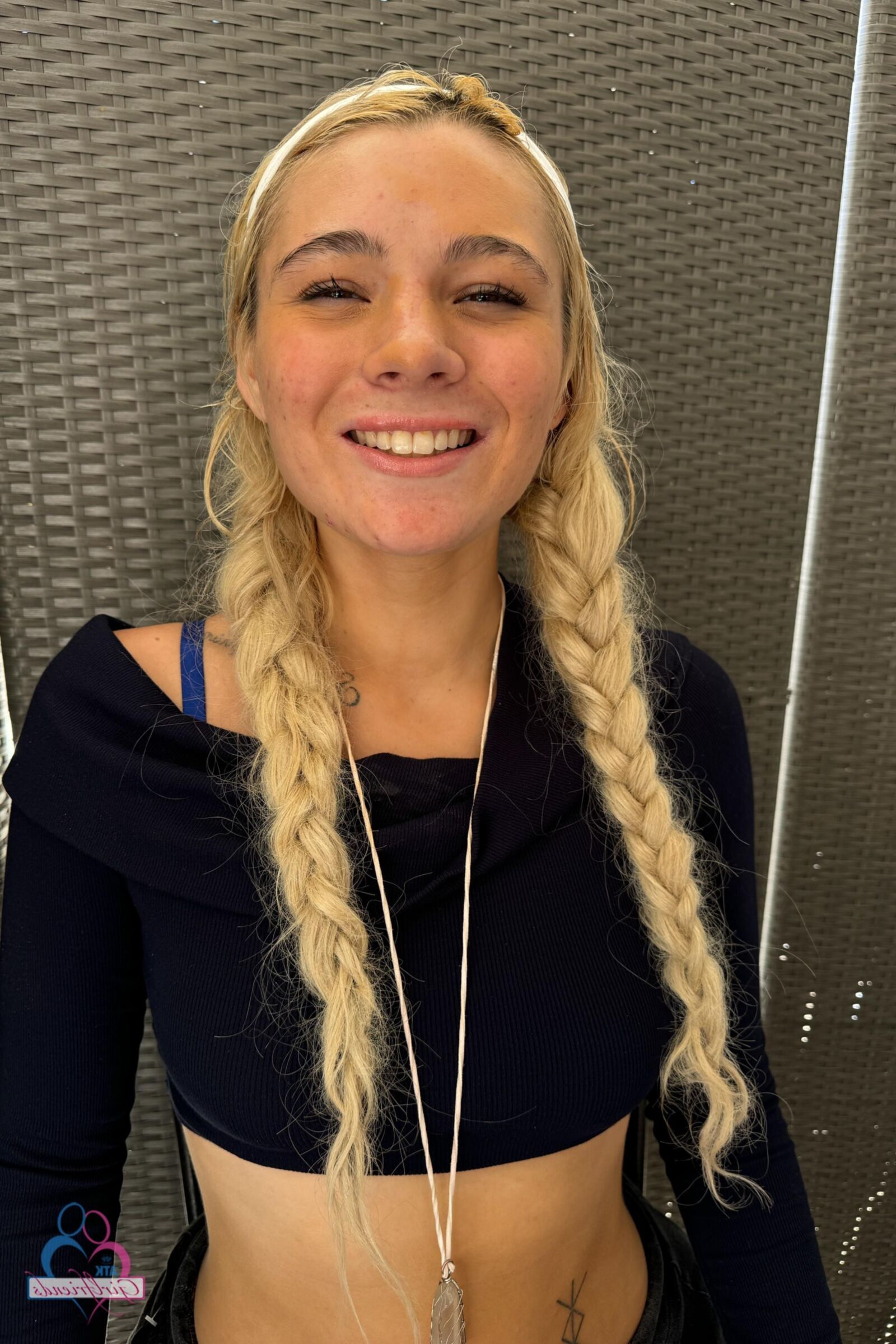 Braided blonde on bed