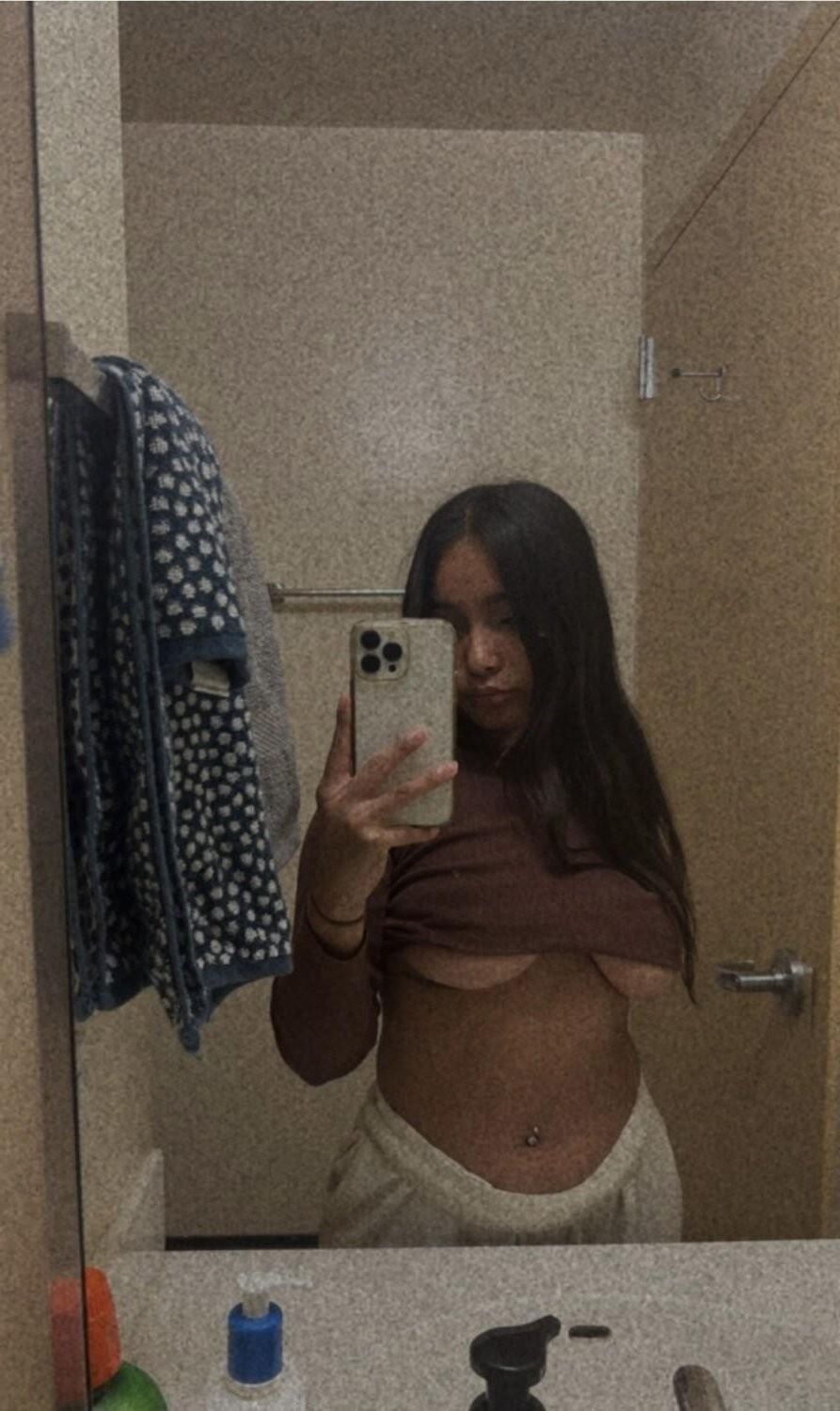 hot college latina showing off her huge tits