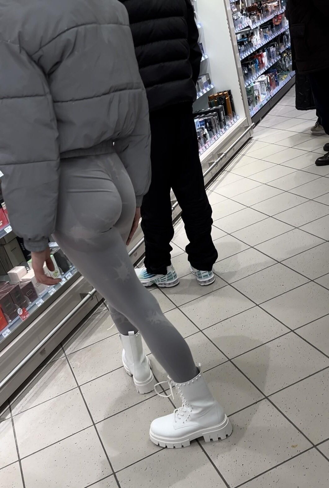 skinny teen in tight leggings bending over