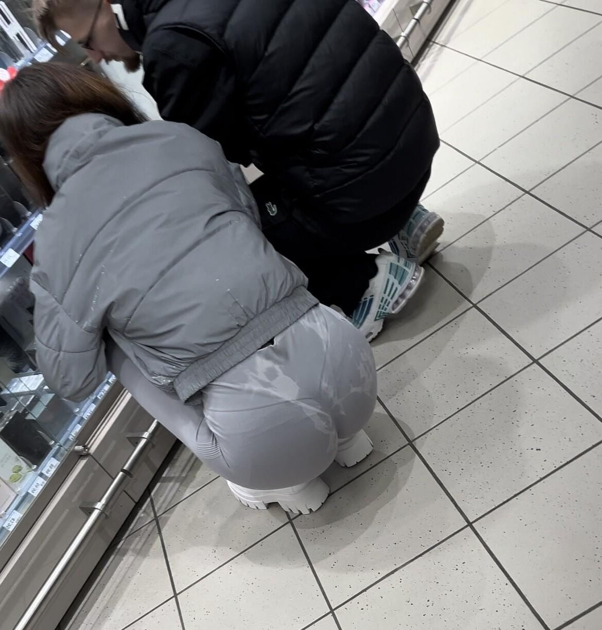 skinny teen in tight leggings bending over