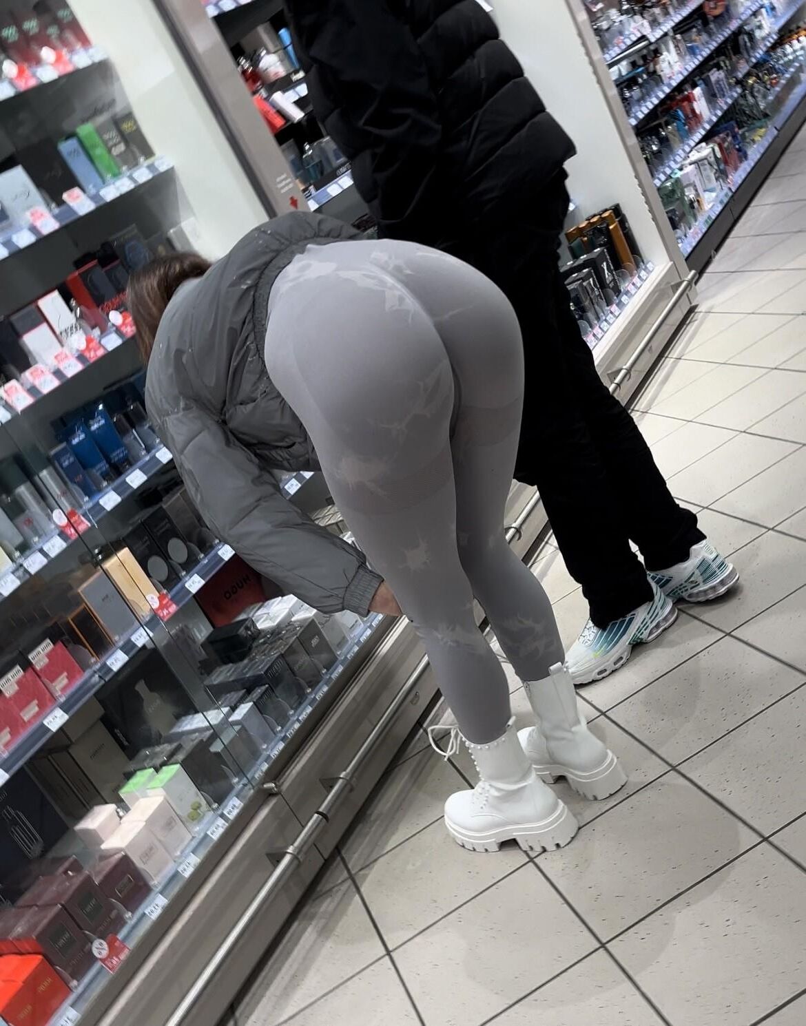 skinny teen in tight leggings bending over