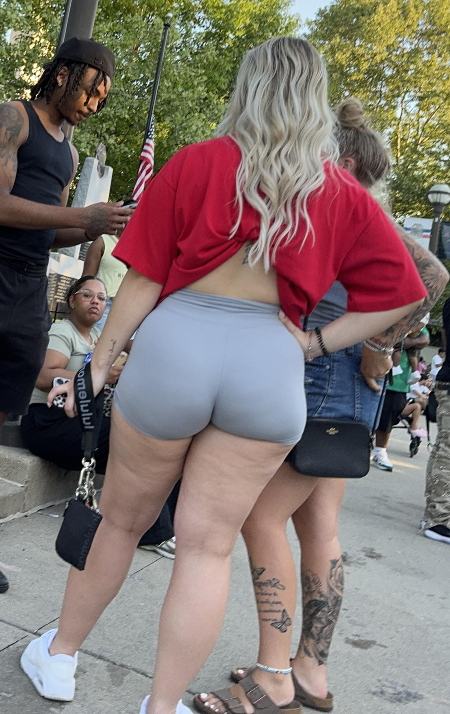 Blonde PAWG with shirt tied up to show off her fat ass