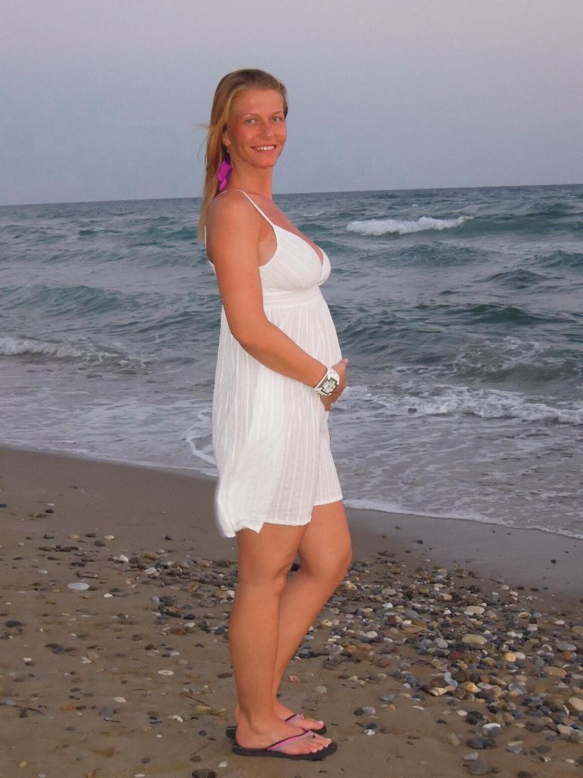 sexy pregnant redhead on holidays