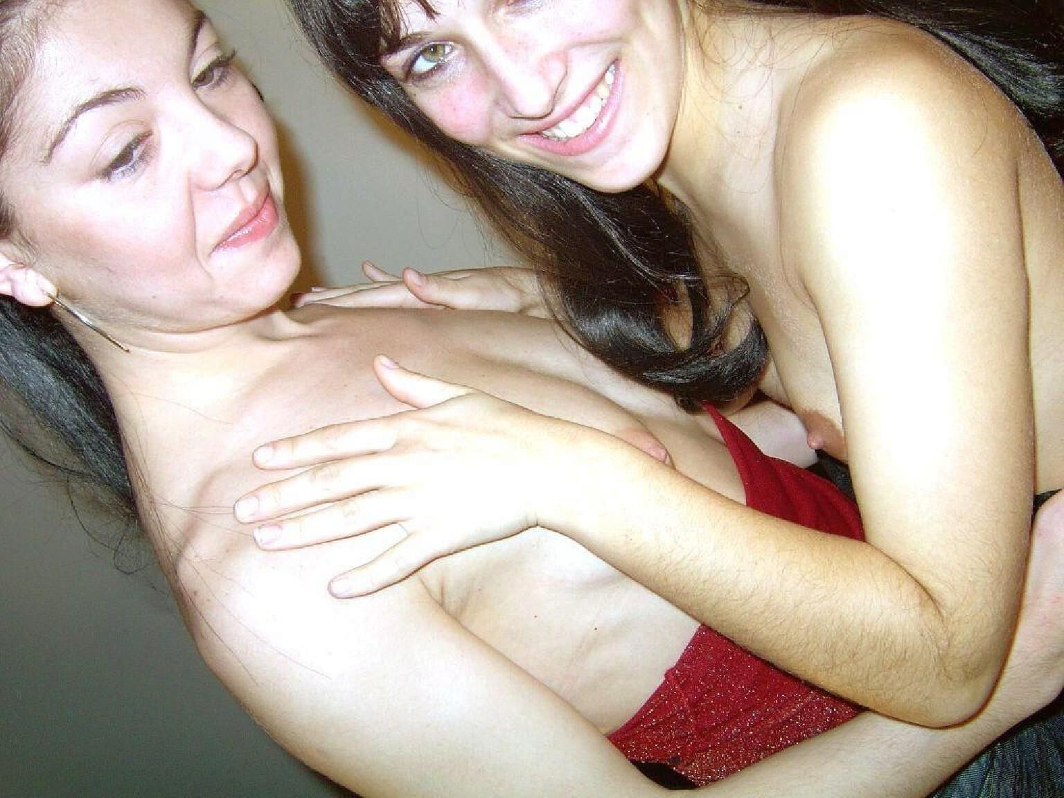 Two lovely lesbian girls with strap on