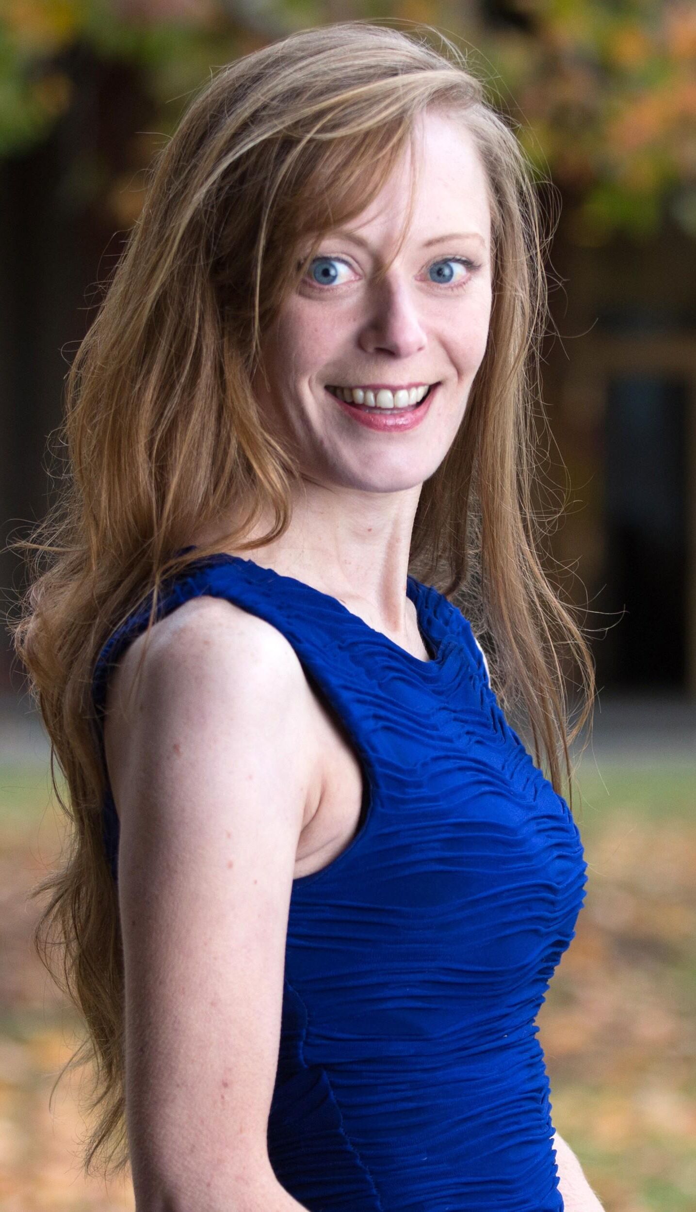 Redhead in Blue Dress