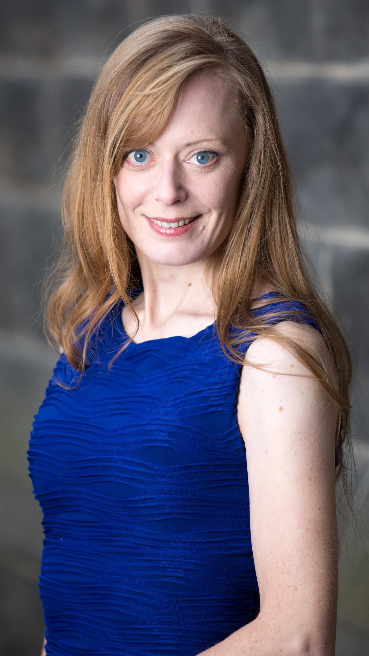 Redhead in Blue Dress