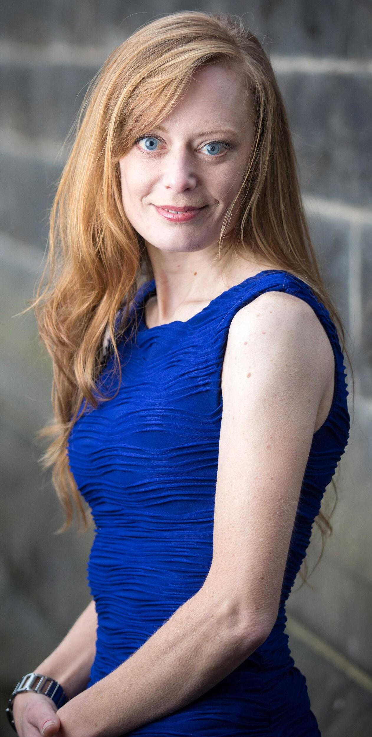 Redhead in Blue Dress