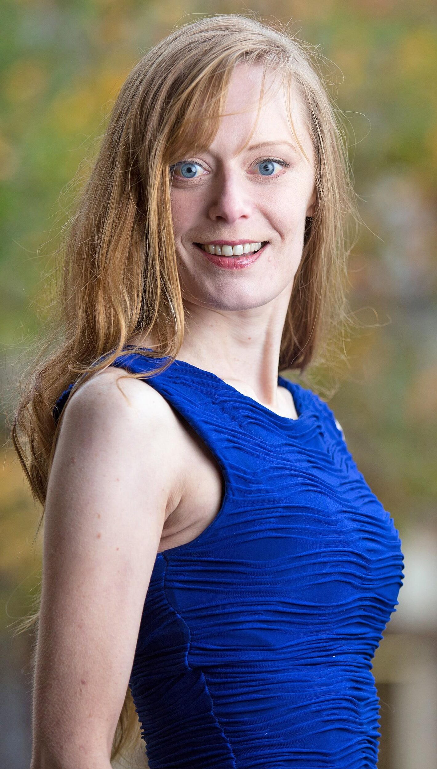 Redhead in Blue Dress