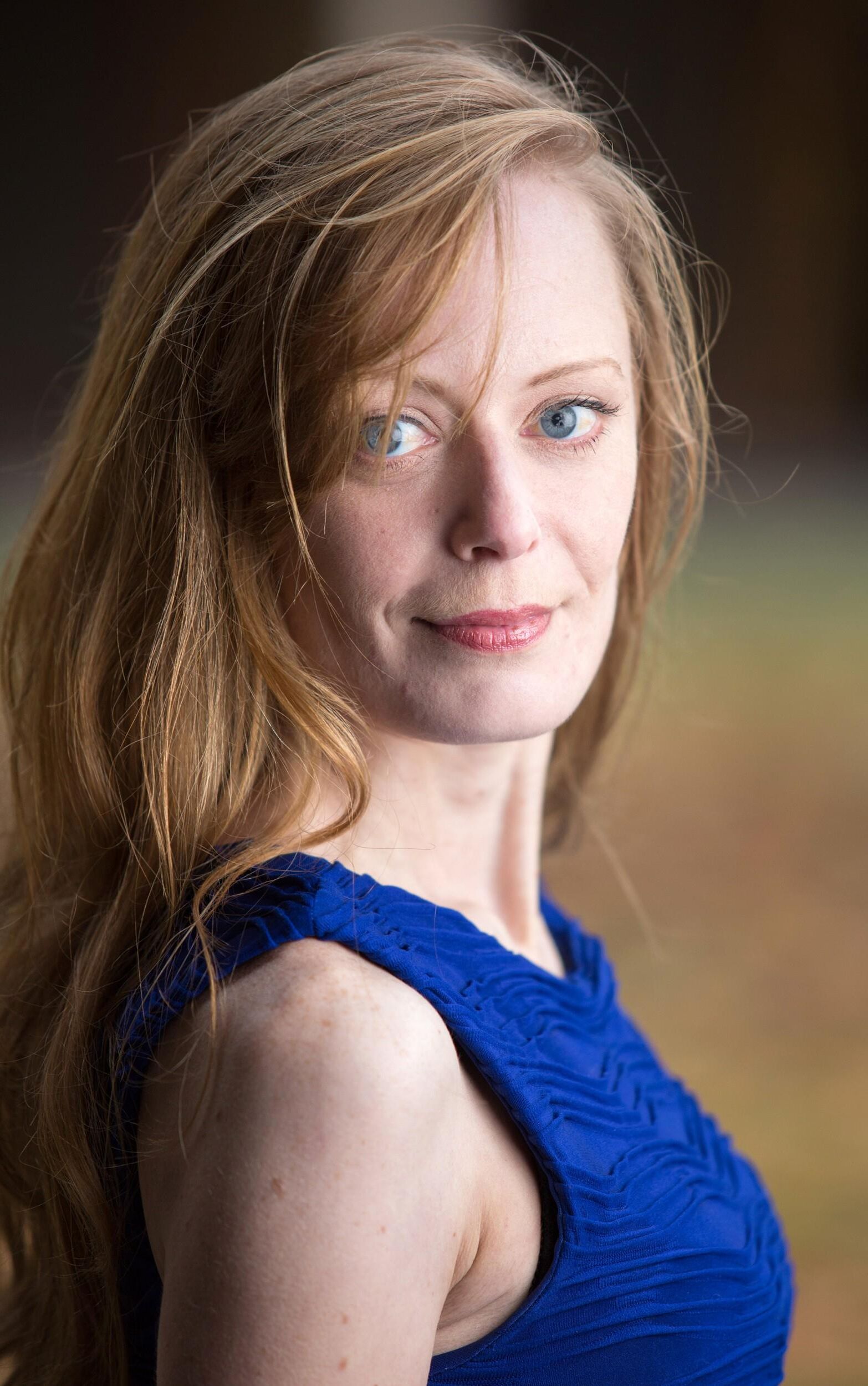 Redhead in Blue Dress