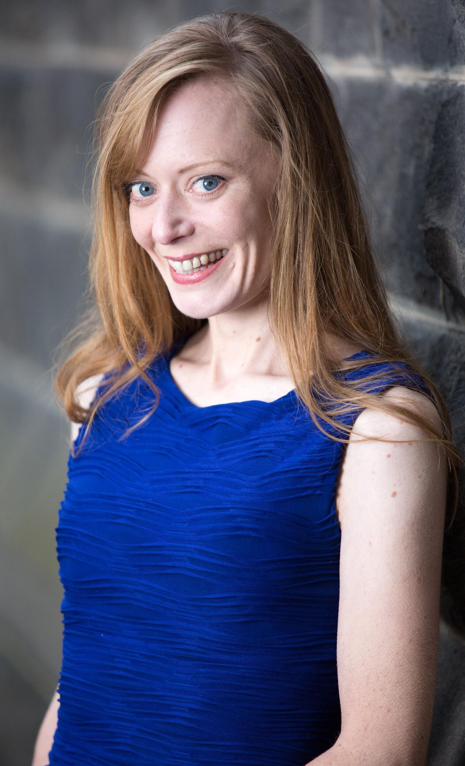 Redhead in Blue Dress