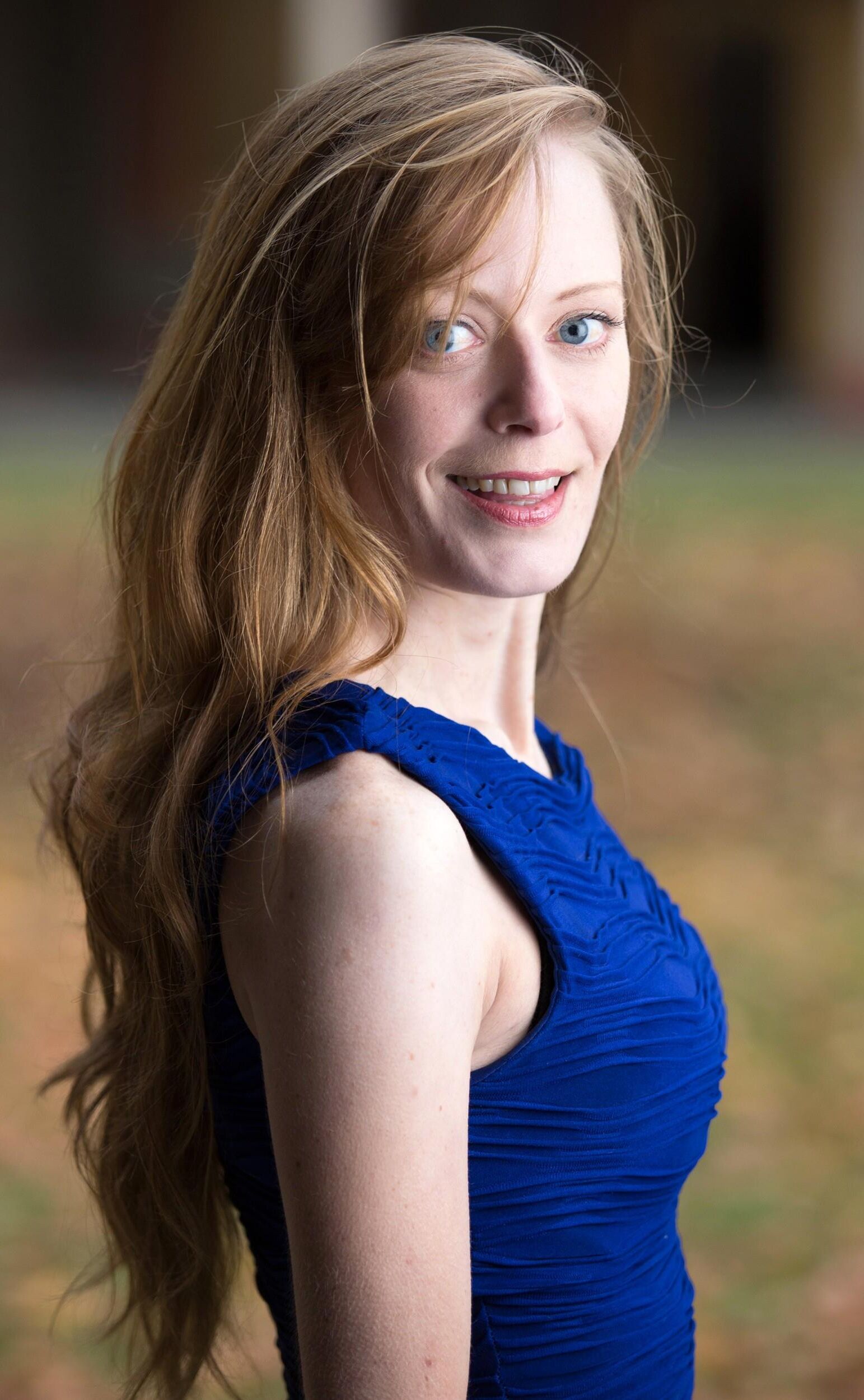 Redhead in Blue Dress