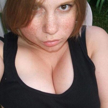 Chubby redhead cutie with great tits