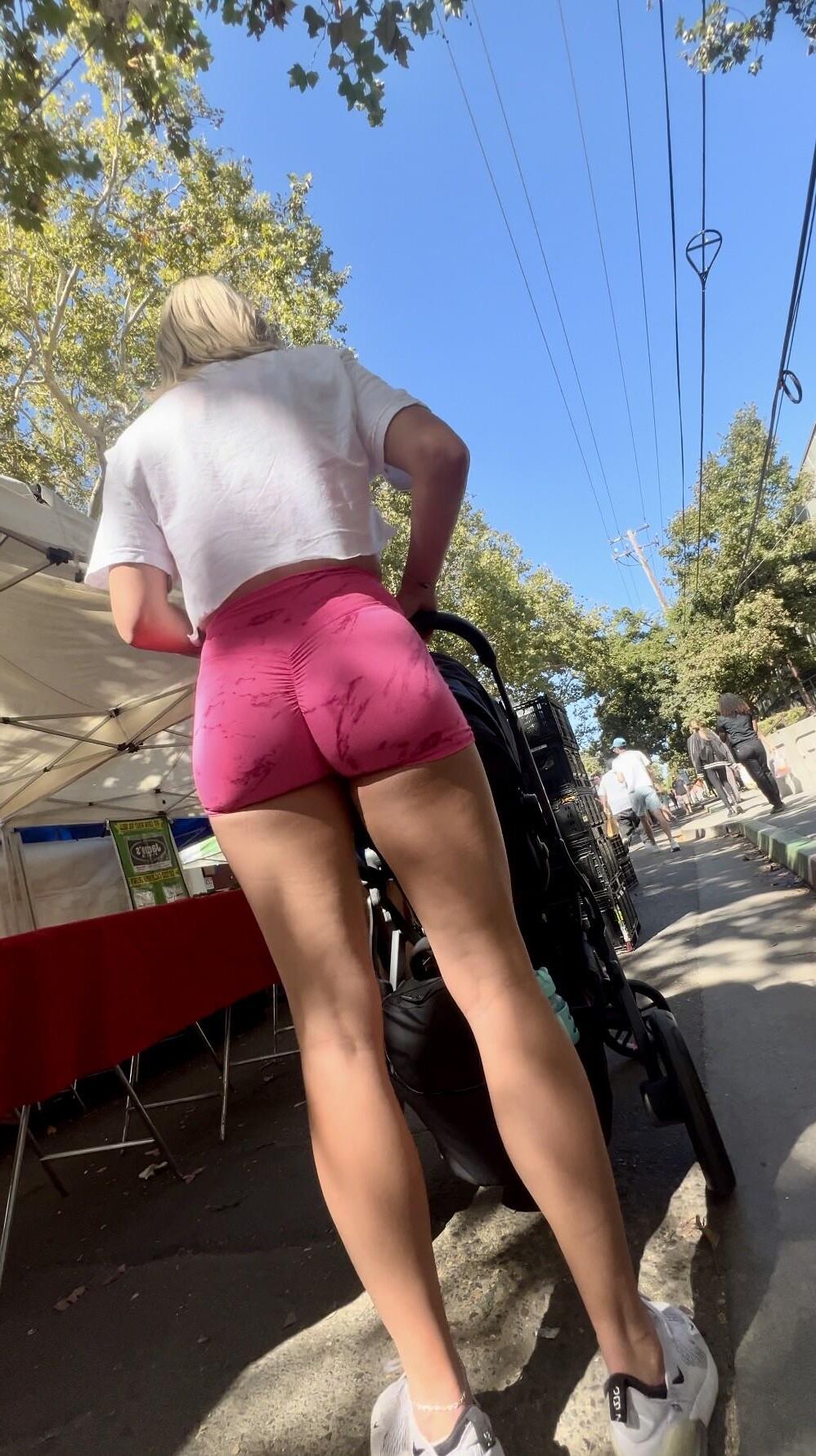 Hot blonde MILF in tight pink shorts