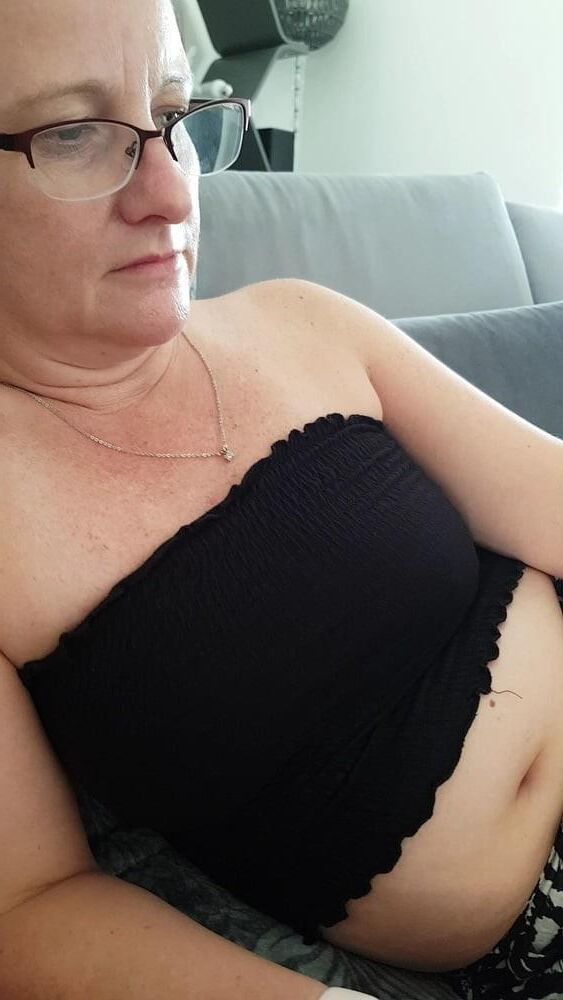 Mature chubby milf in her bra, want her to take any off? 