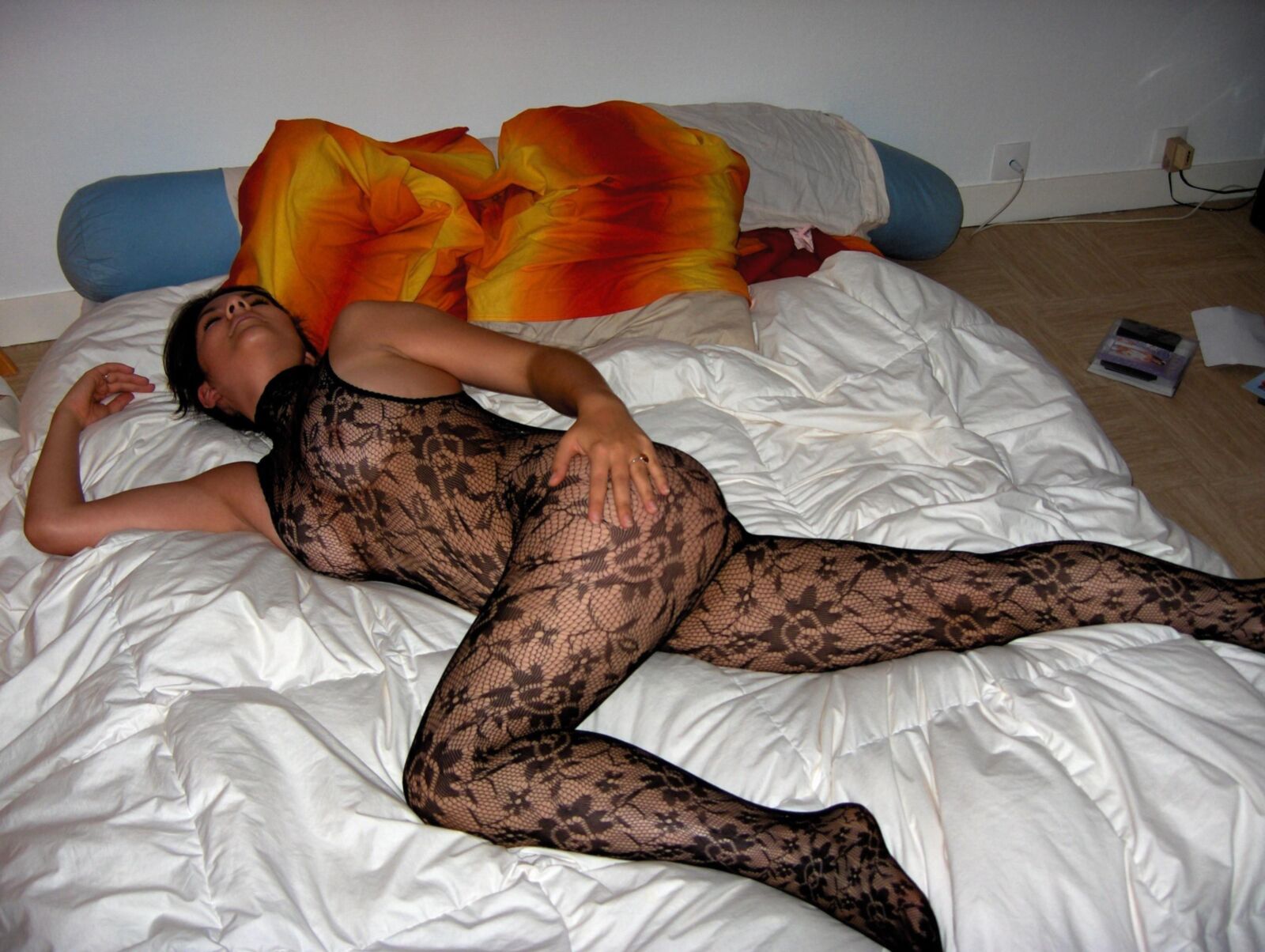 Cute girl in black bodystocking