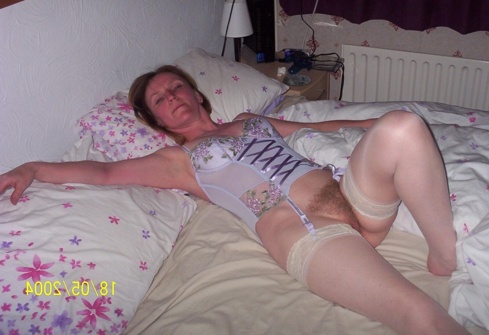 Women Waiting for you in Bed Lying Down Knees Up Arms Back