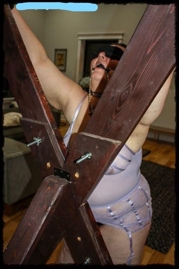 chained on the cross used by a Master and his slave