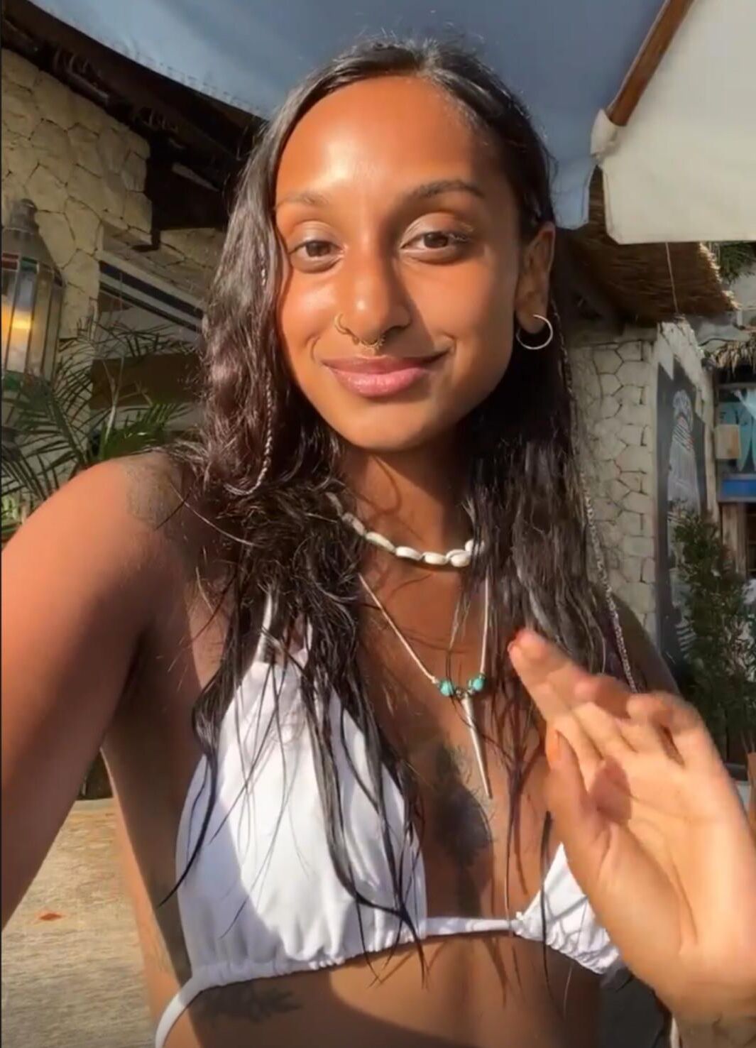 Jitta White bikini portrait.
