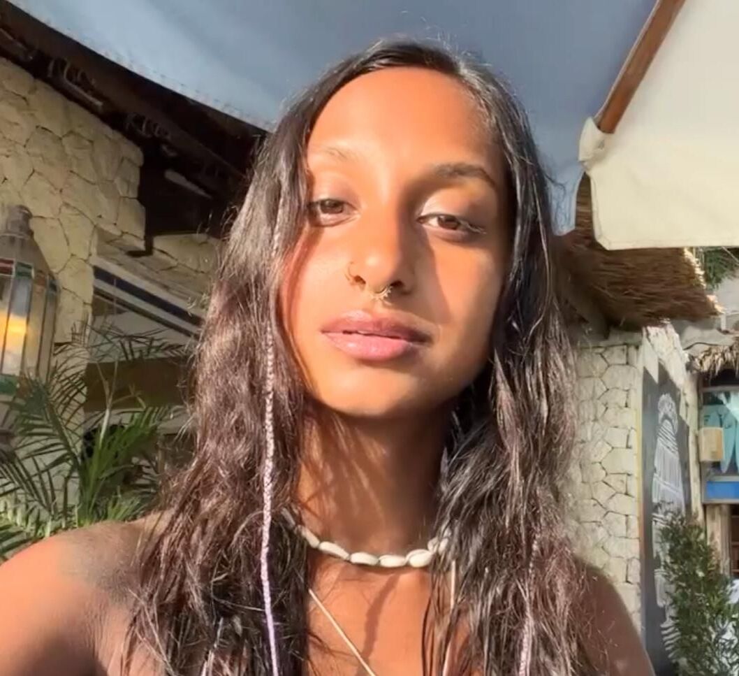 Jitta White bikini portrait.